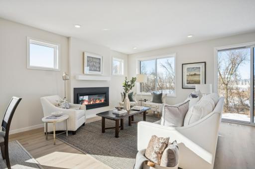 One-level living plus finished lower level! 2 bedrooms plus office on main floor! And Another bedroom and bath and large storage room at lower level! Amazing Backyard Views! Abundance of windows!