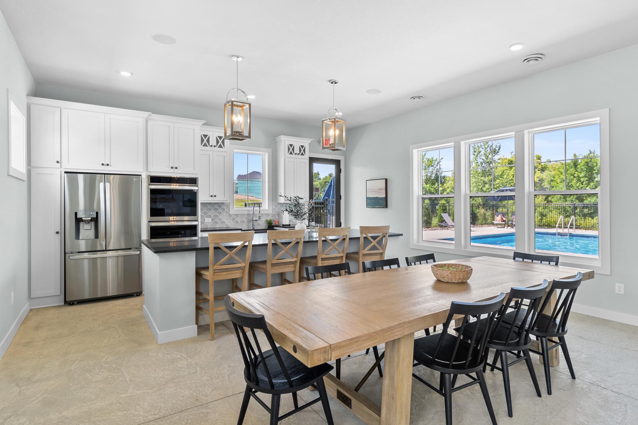 Riverwalk Clubhouse features gathering room with fireplace, huge kitchen and dining room. For Riverwalk homeowners: reserve for your get-together, event or party!