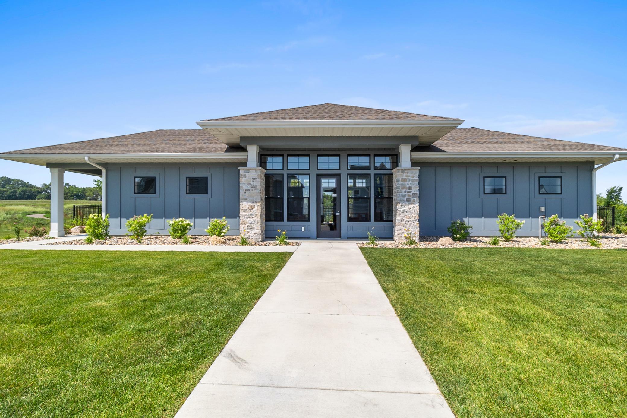 Riverwalk Clubhouse features gathering room with fireplace, huge kitchen and dining room. For Riverwalk homeowners: reserve for your get-together, event or party!