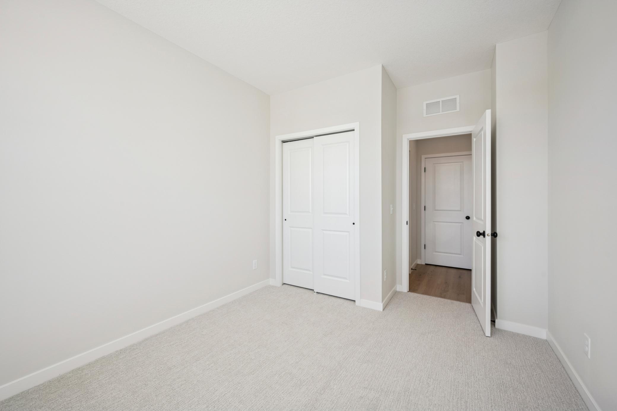 Front bedroom or office with closet