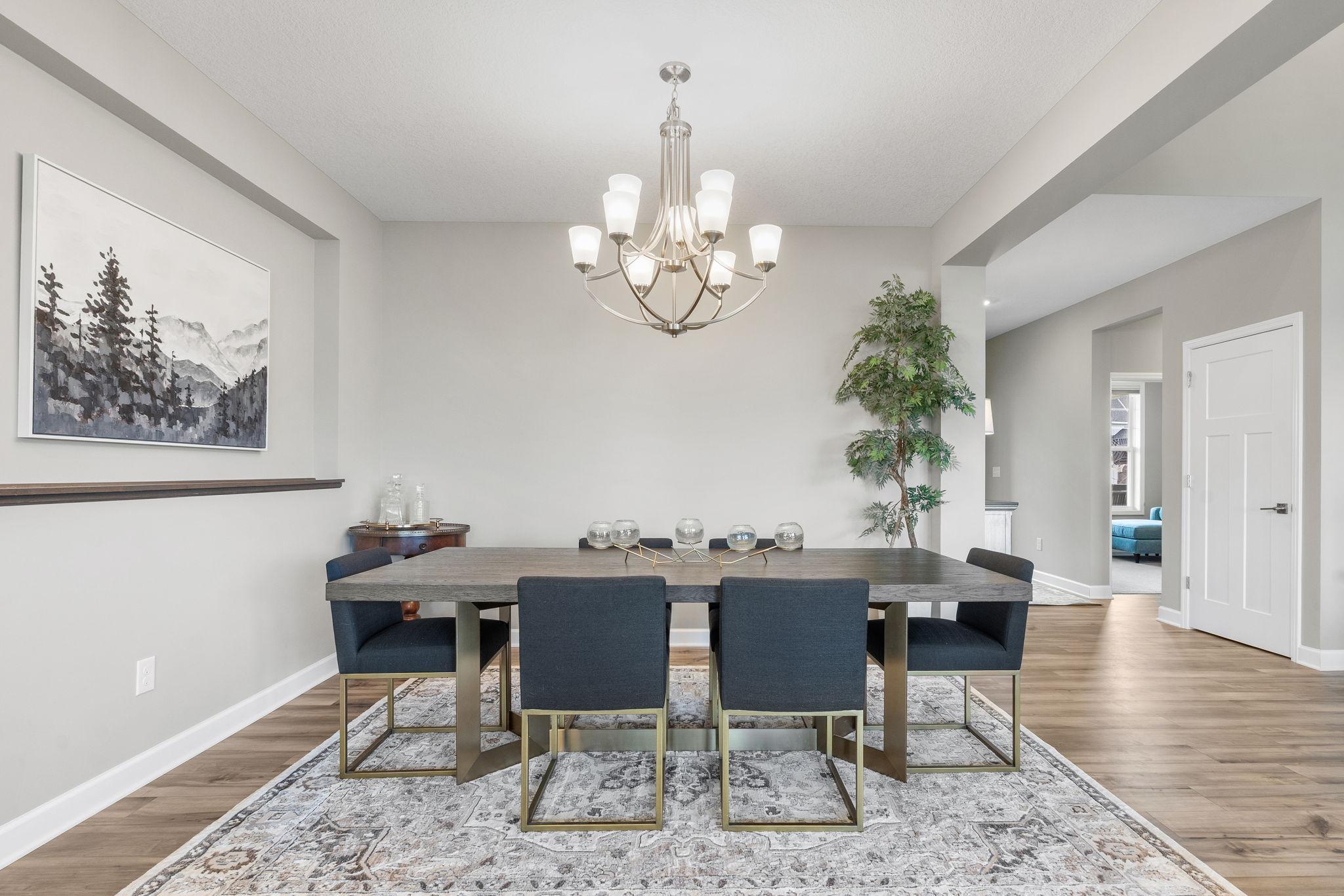 Formal dining room in addition to in-formal and kitchen breakfast bar