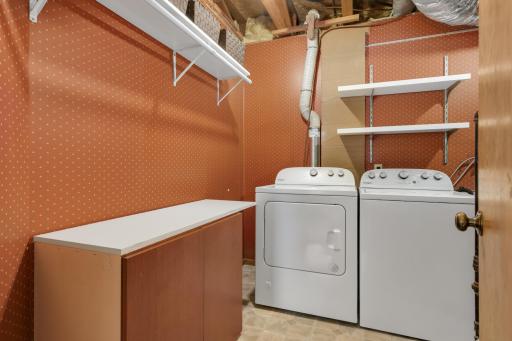 Lower level laundry with brand new washer. (May 2026)
