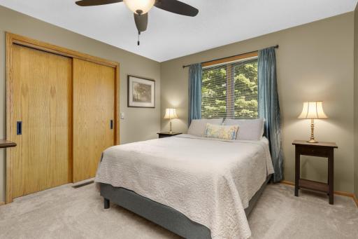 Second upper-level bedroom situated on the side of the home.