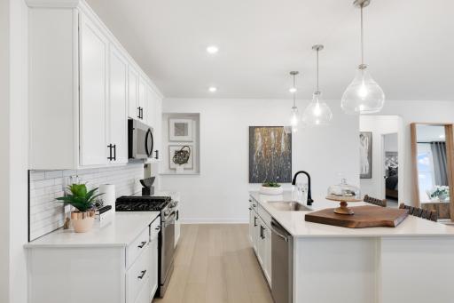 Residents can seamlessly transition between cooking, eating and cleaning with the kitchenâs airy design
