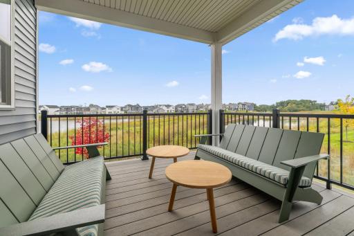 Accessible off the dining room, this covered patio is where residents can bask in views of the neighborhood and enjoy leisurely activities in the open air.