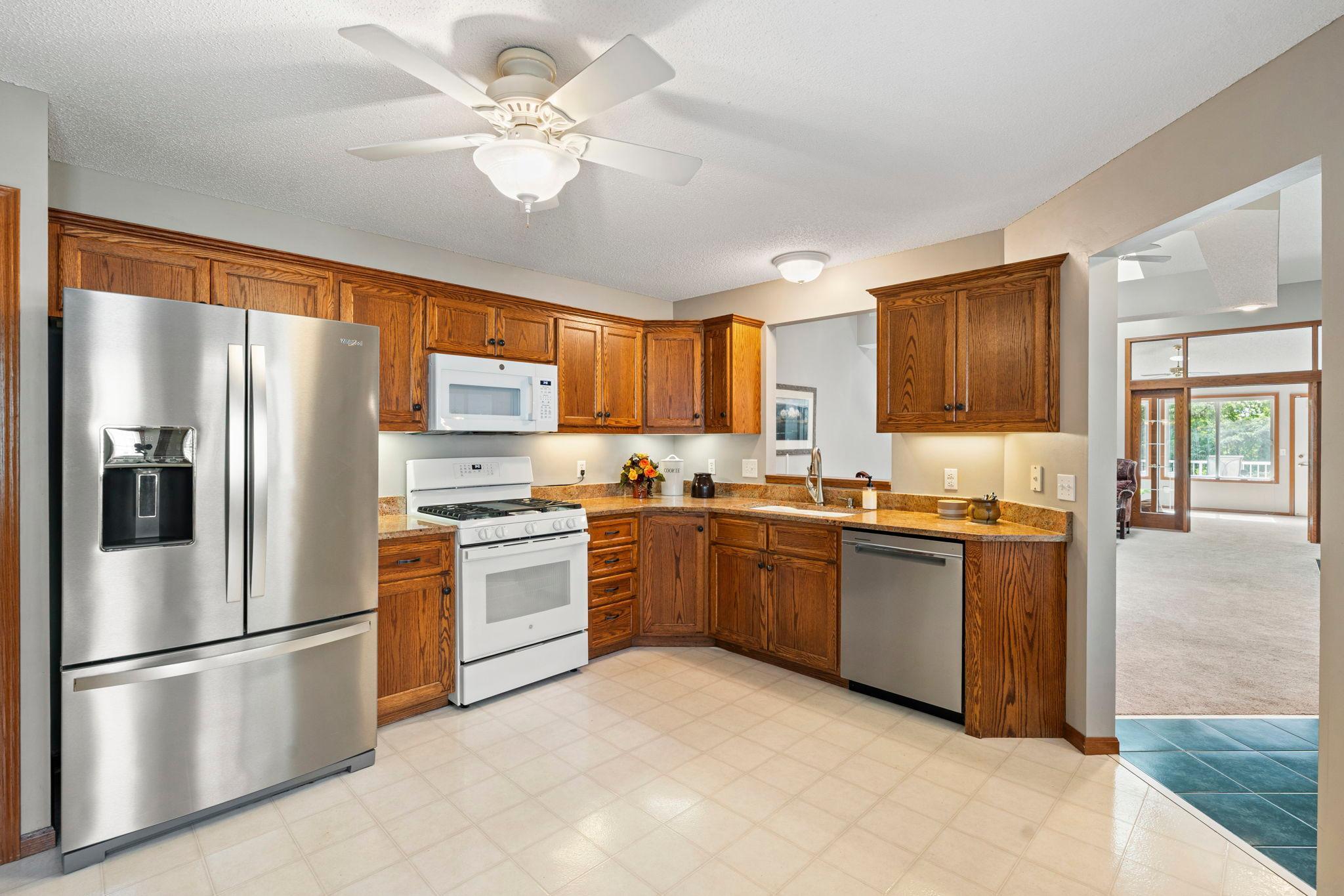 Stainless steel refrigerator and dishwasher installed in 2024. Gas stove and built-in microwave new in 2021. Ample cabinetry and counter space.