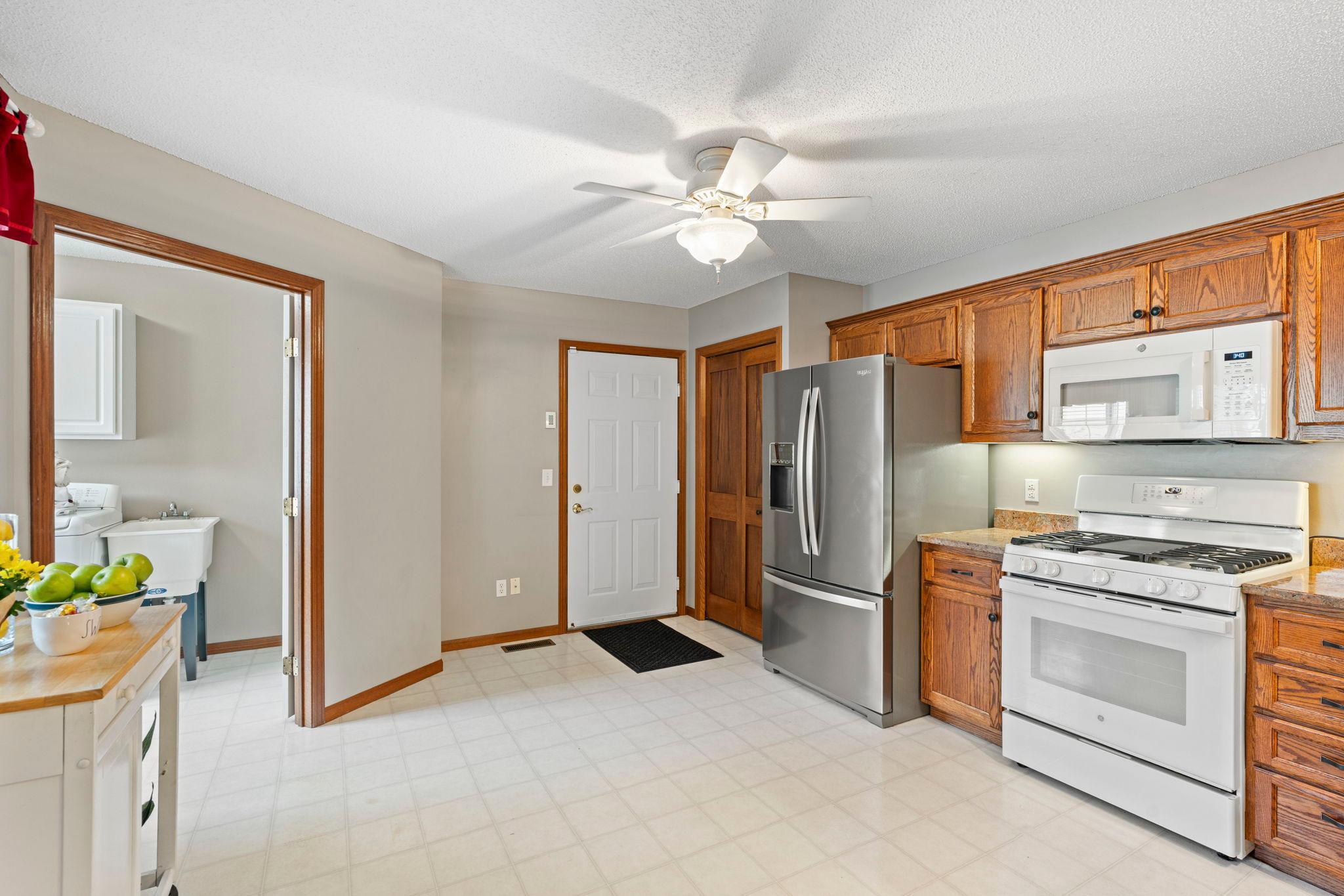 This large, eat-in kitchen has room for an island and/or table and chairs.