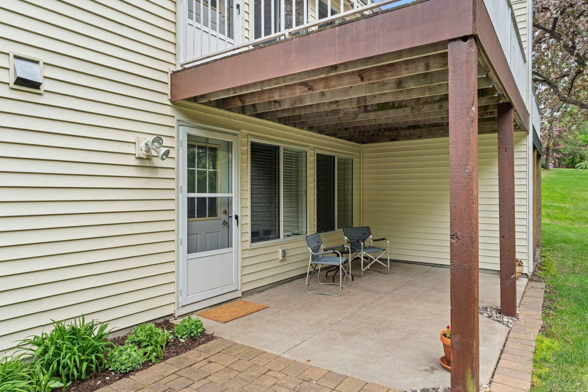 Walk out from the family room to this covered patio and private backyard with lots of green space.