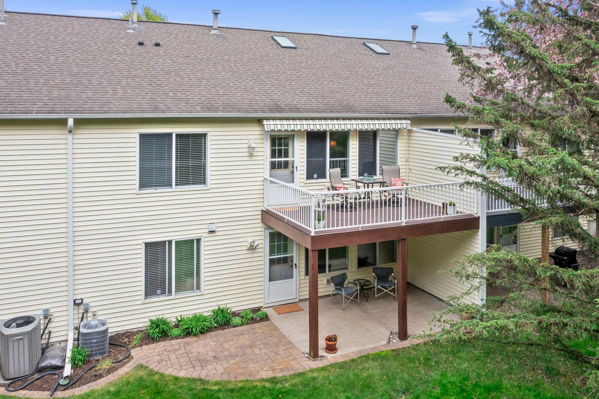 Awesome aerial view of the home showing the deck and patio. The deck has a remote controlled retractable awning.