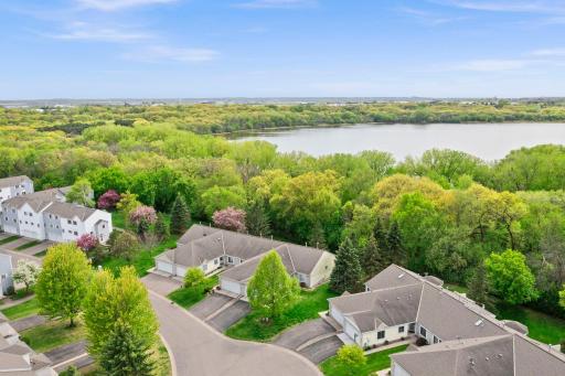 Great view of the house, trees and Staring Lake.