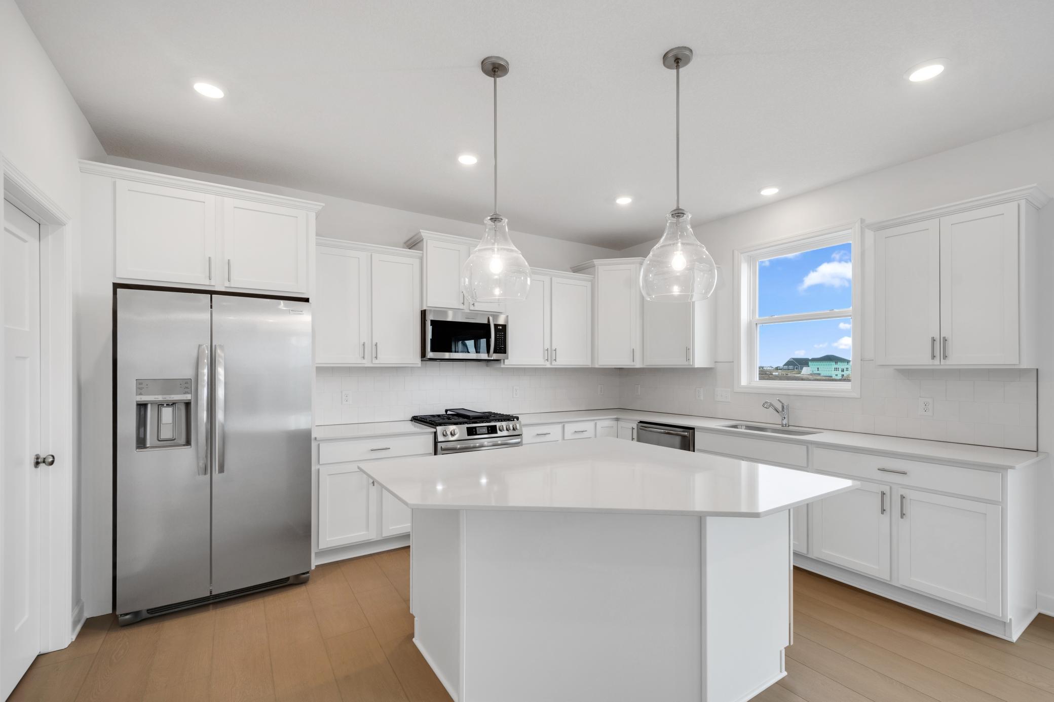 (Photo of a similar home, actual finishes may vary)