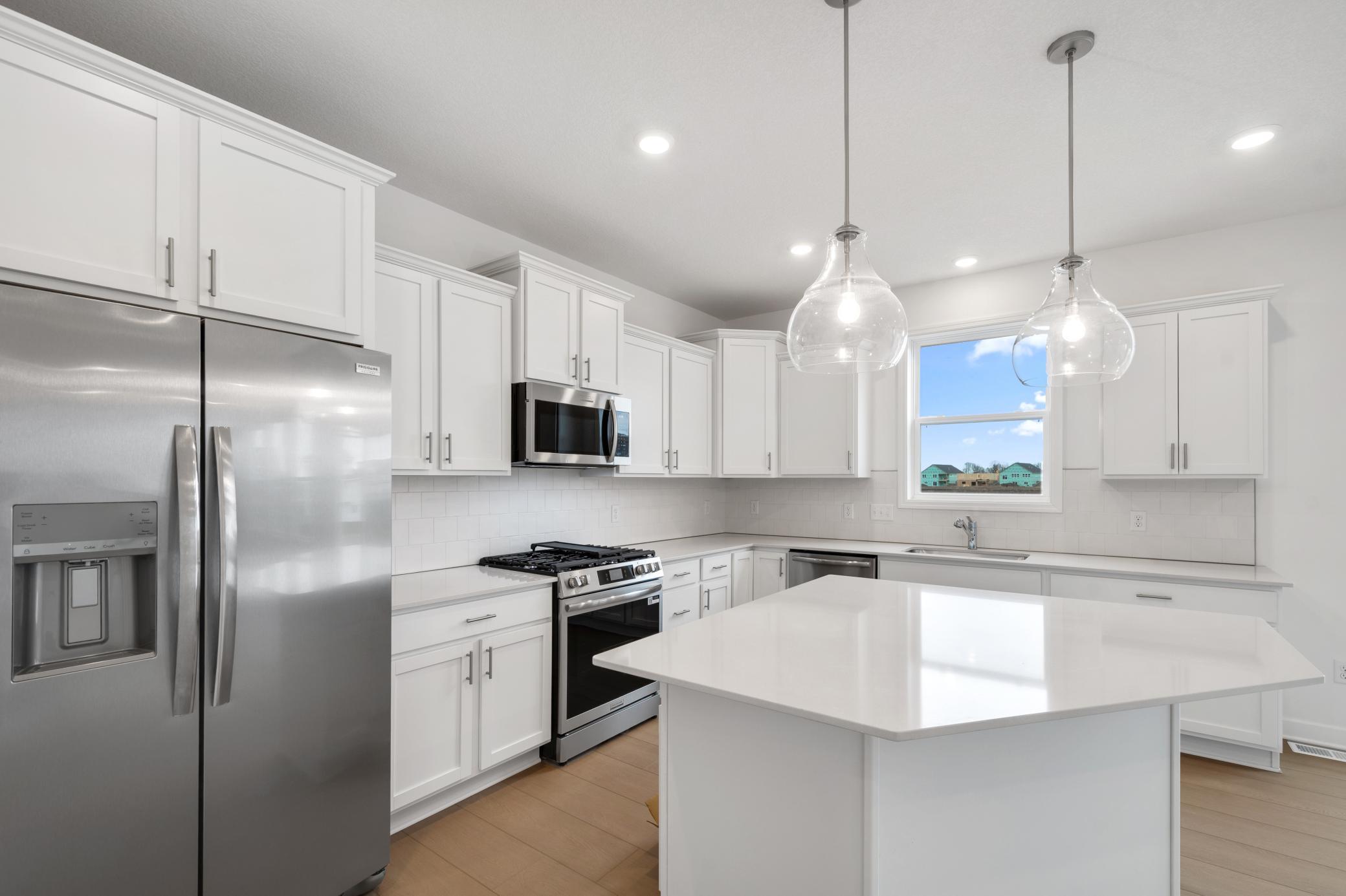 (Photo of a similar home, actual finishes may vary)