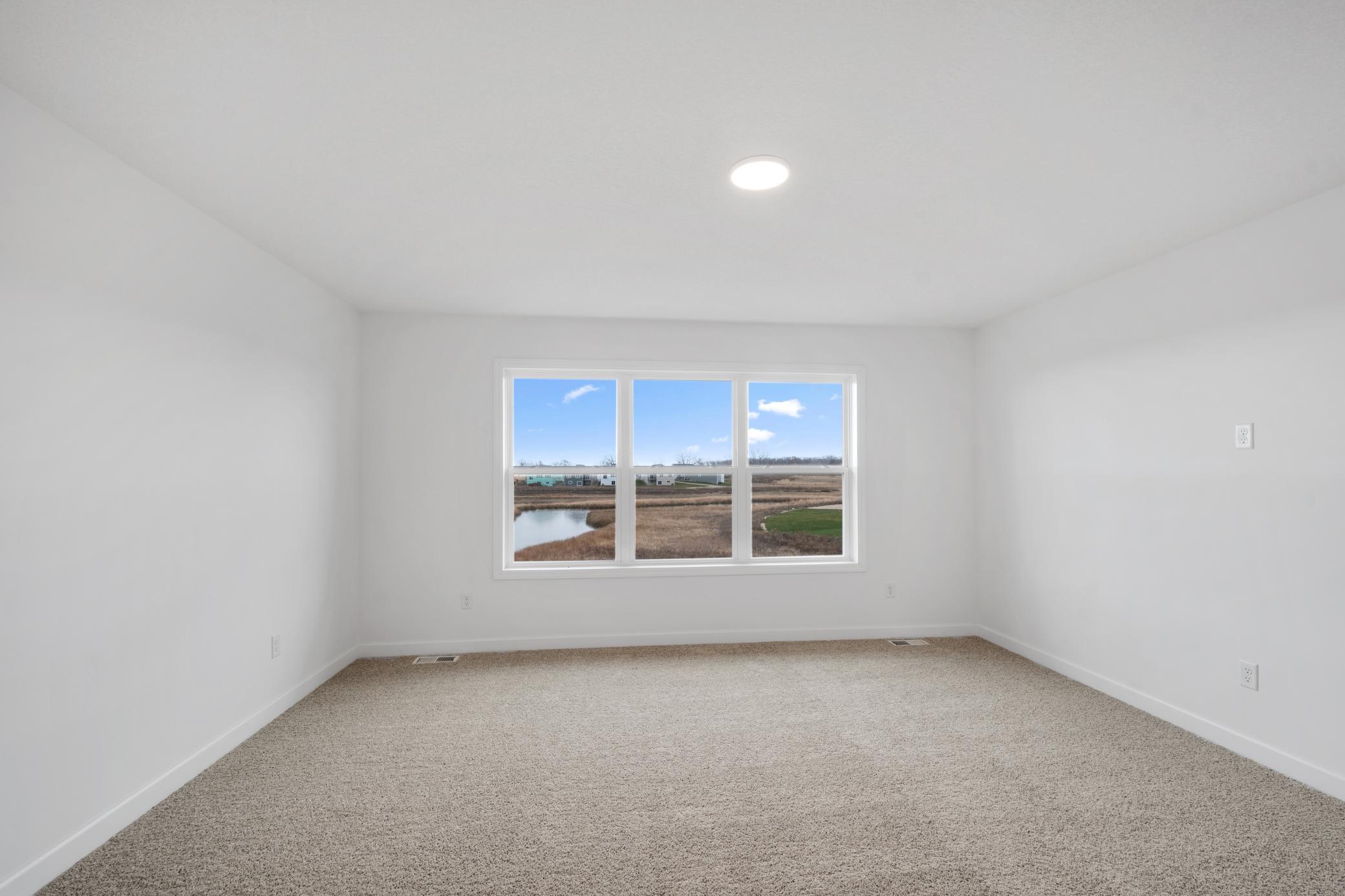 (Photo of a similar home, actual finishes may vary)