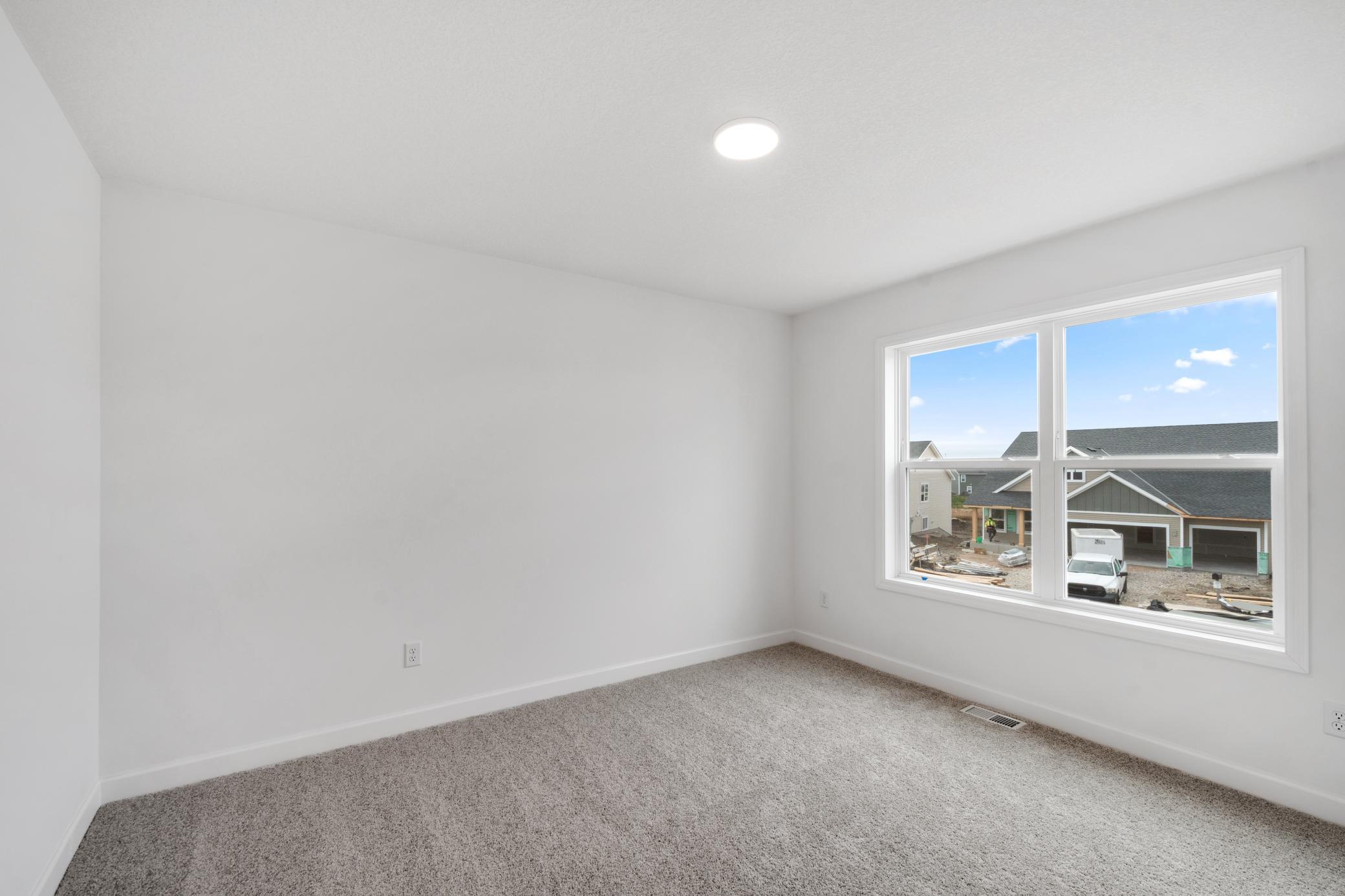 (Photo of a similar home, actual finishes may vary)