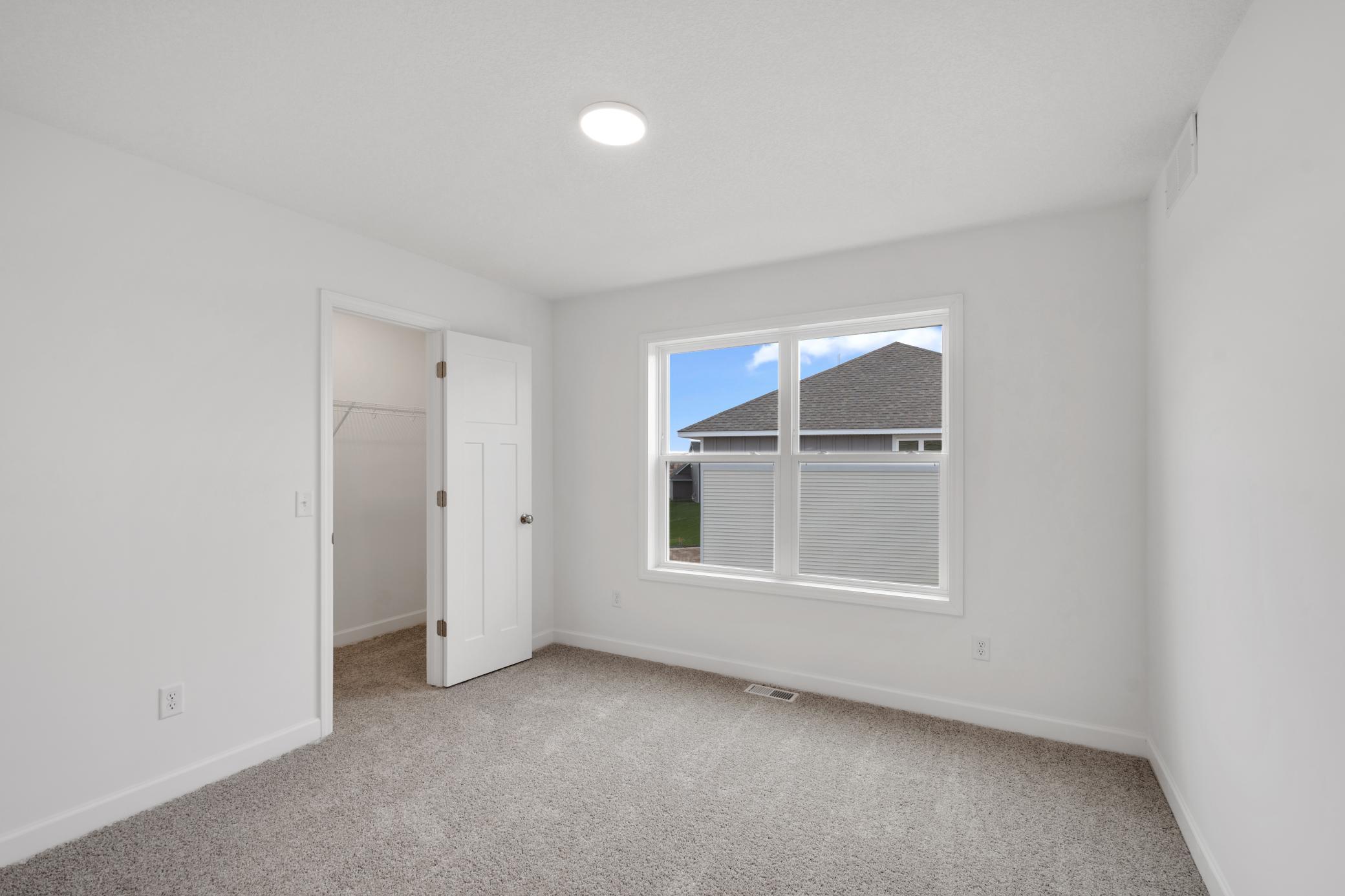 (Photo of a similar home, actual finishes may vary)