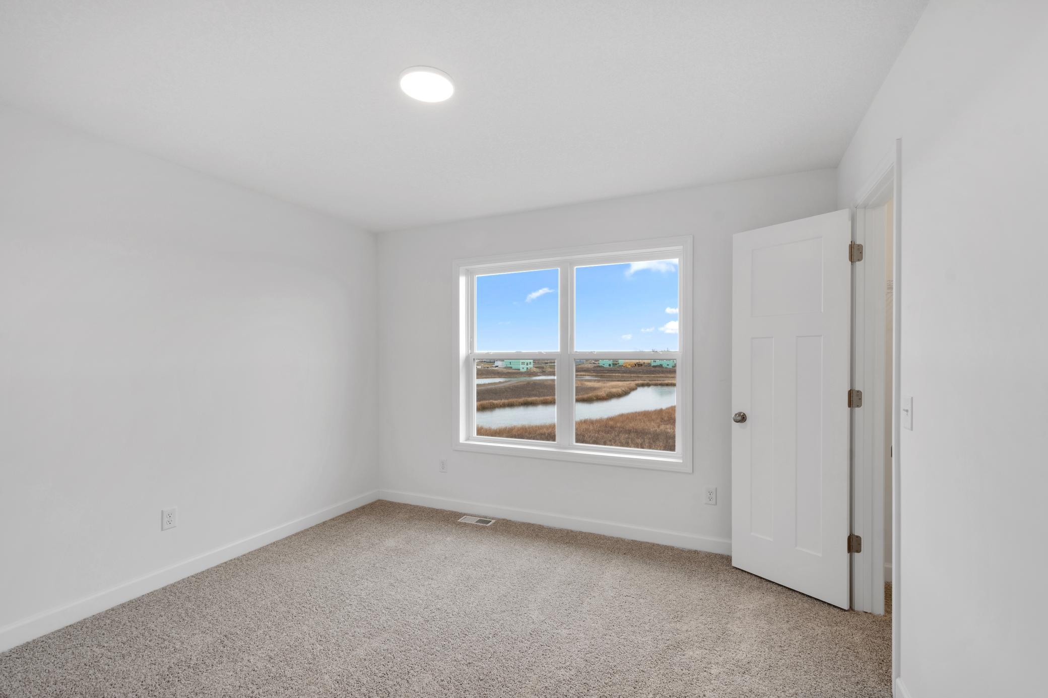 (Photo of a similar home, actual finishes may vary)