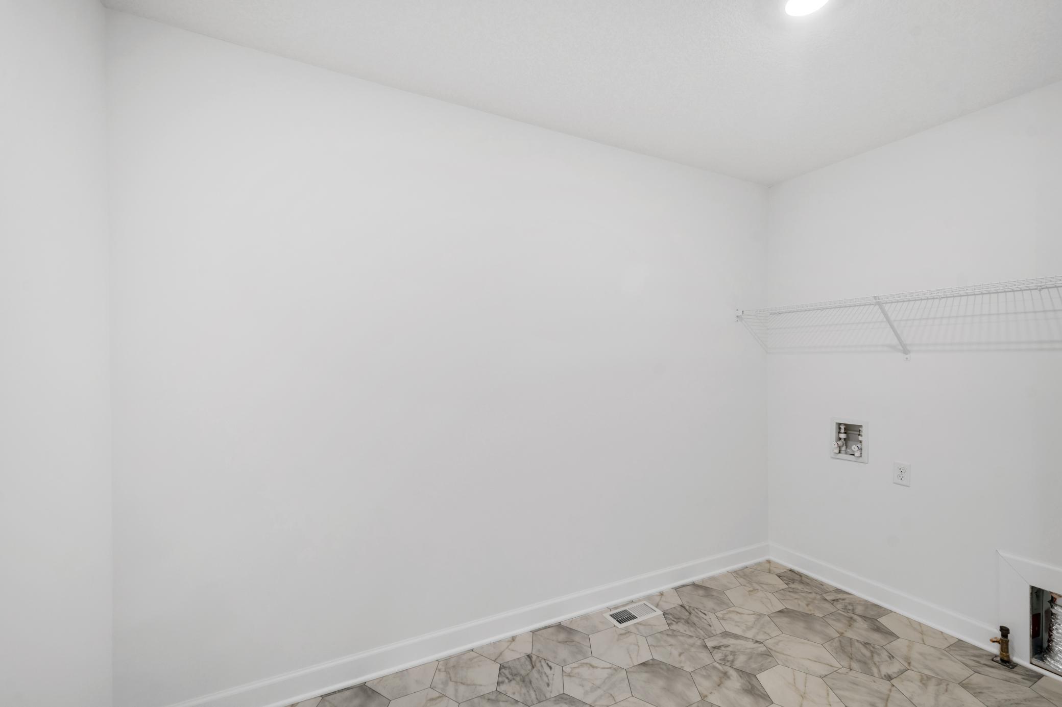 (Photo of a similar home, actual finishes may vary)