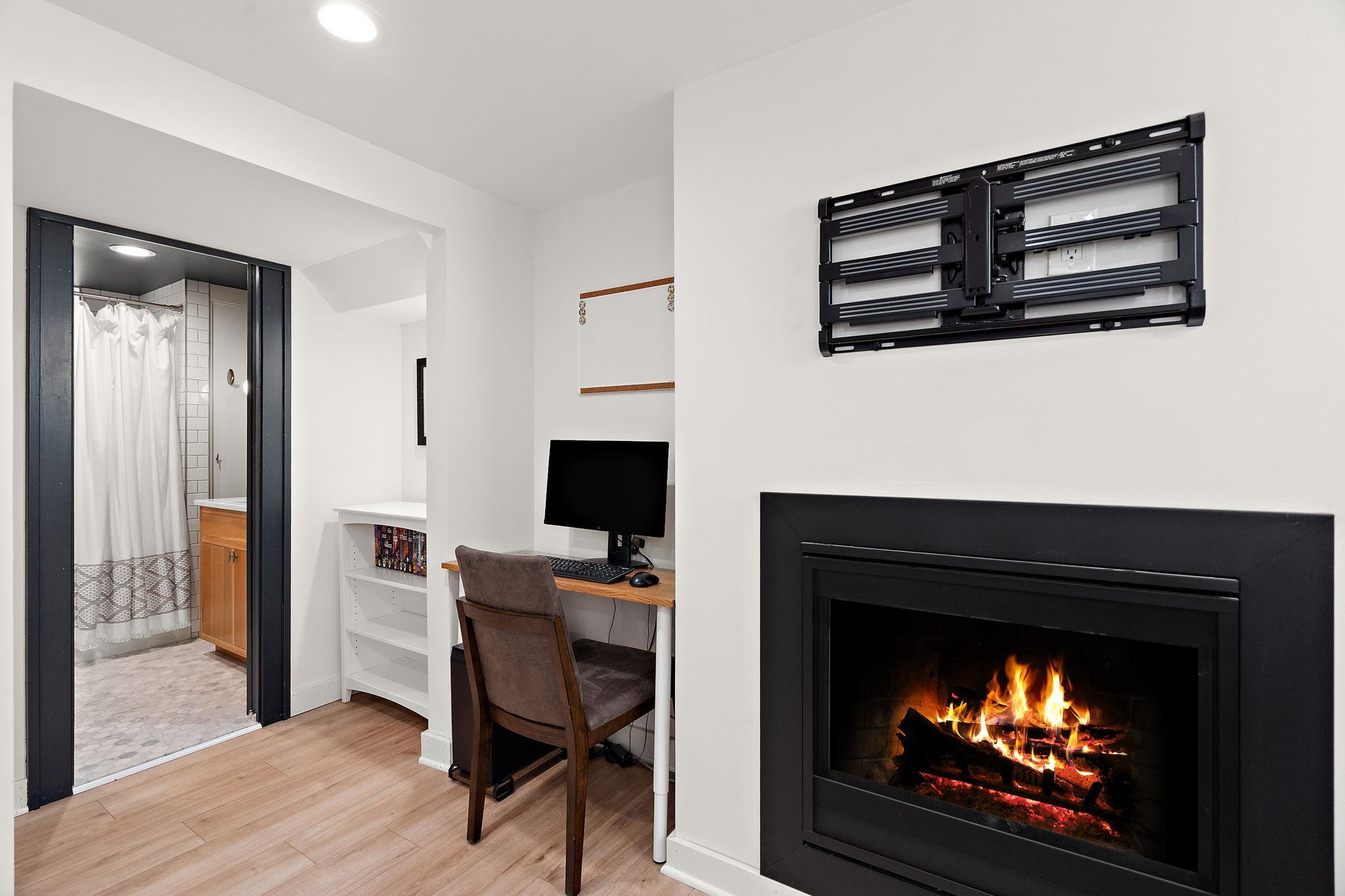 A lower level fireplace to take the winter edge off