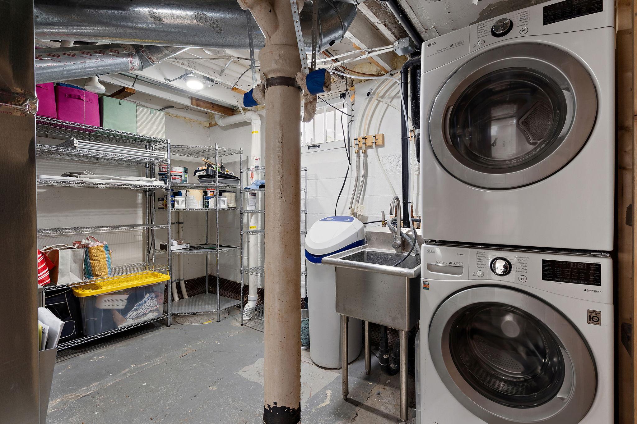 Lower level utility room with lots of storage capability