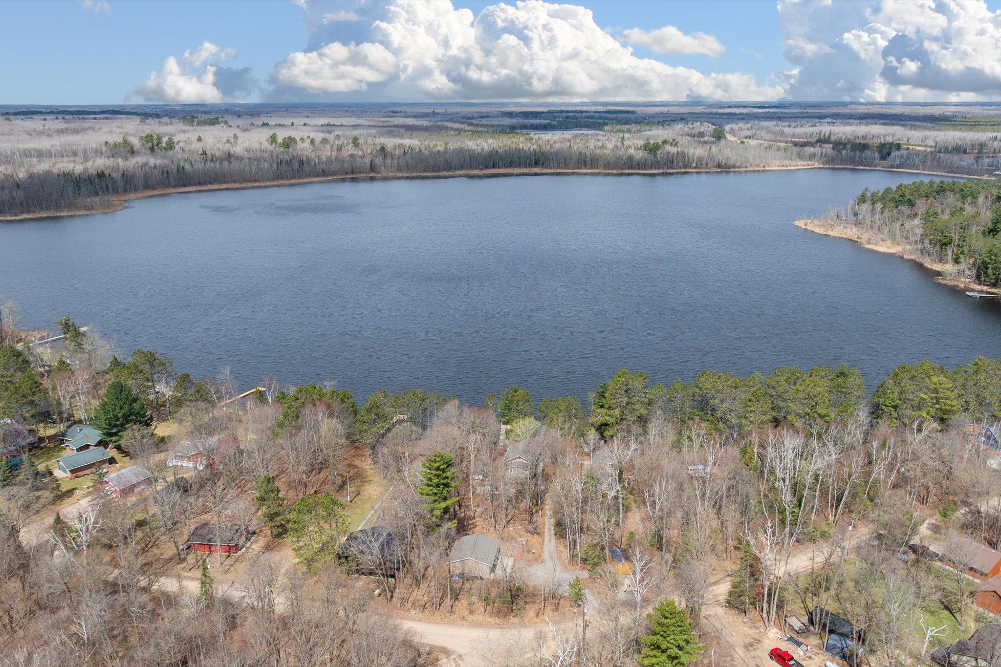 Aerial perspective of Vermillion Lake, highlighting the two-cabin setting below.