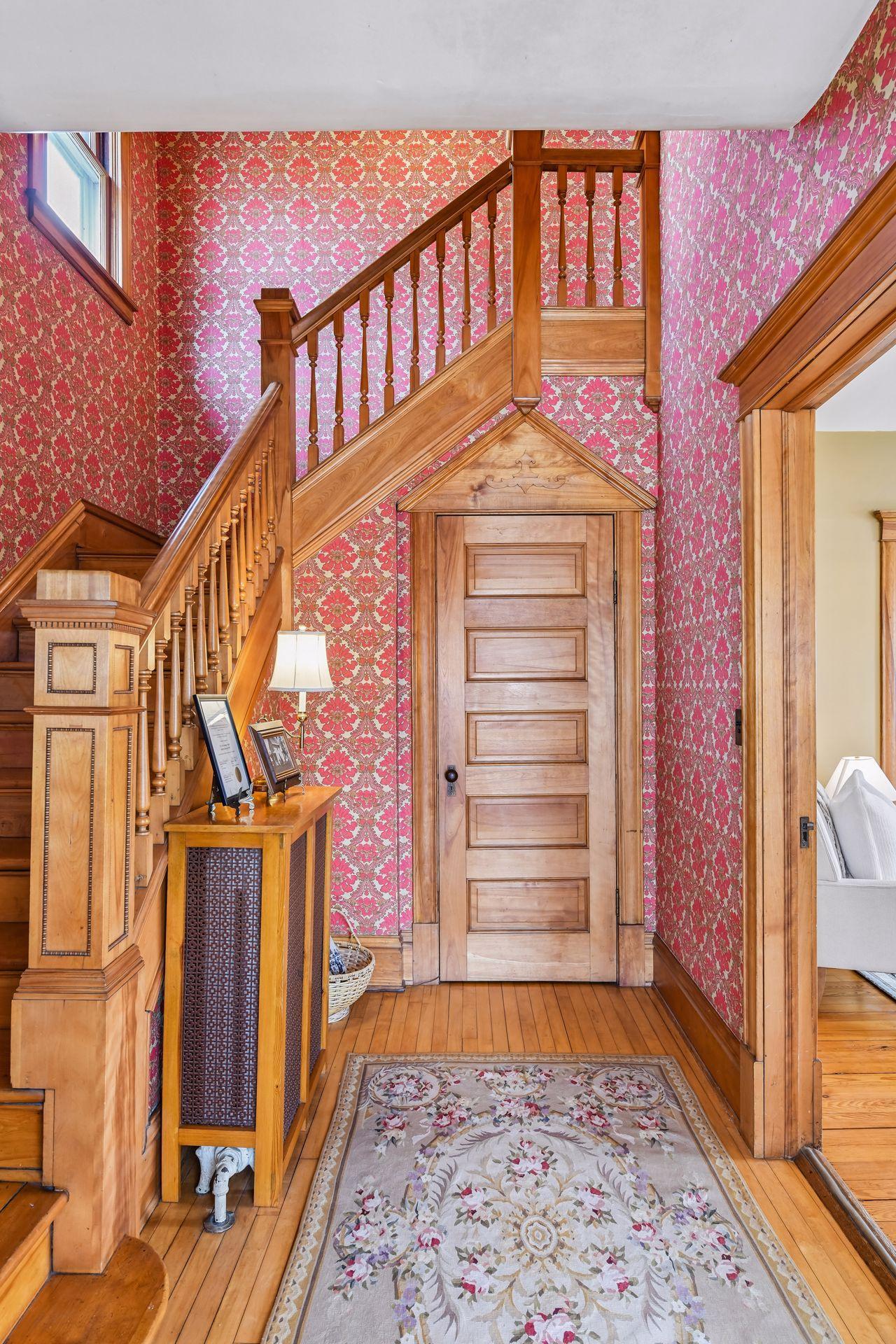 Five-panel doors throughout the main floor reflect the home’s original quality and craftsmanship.