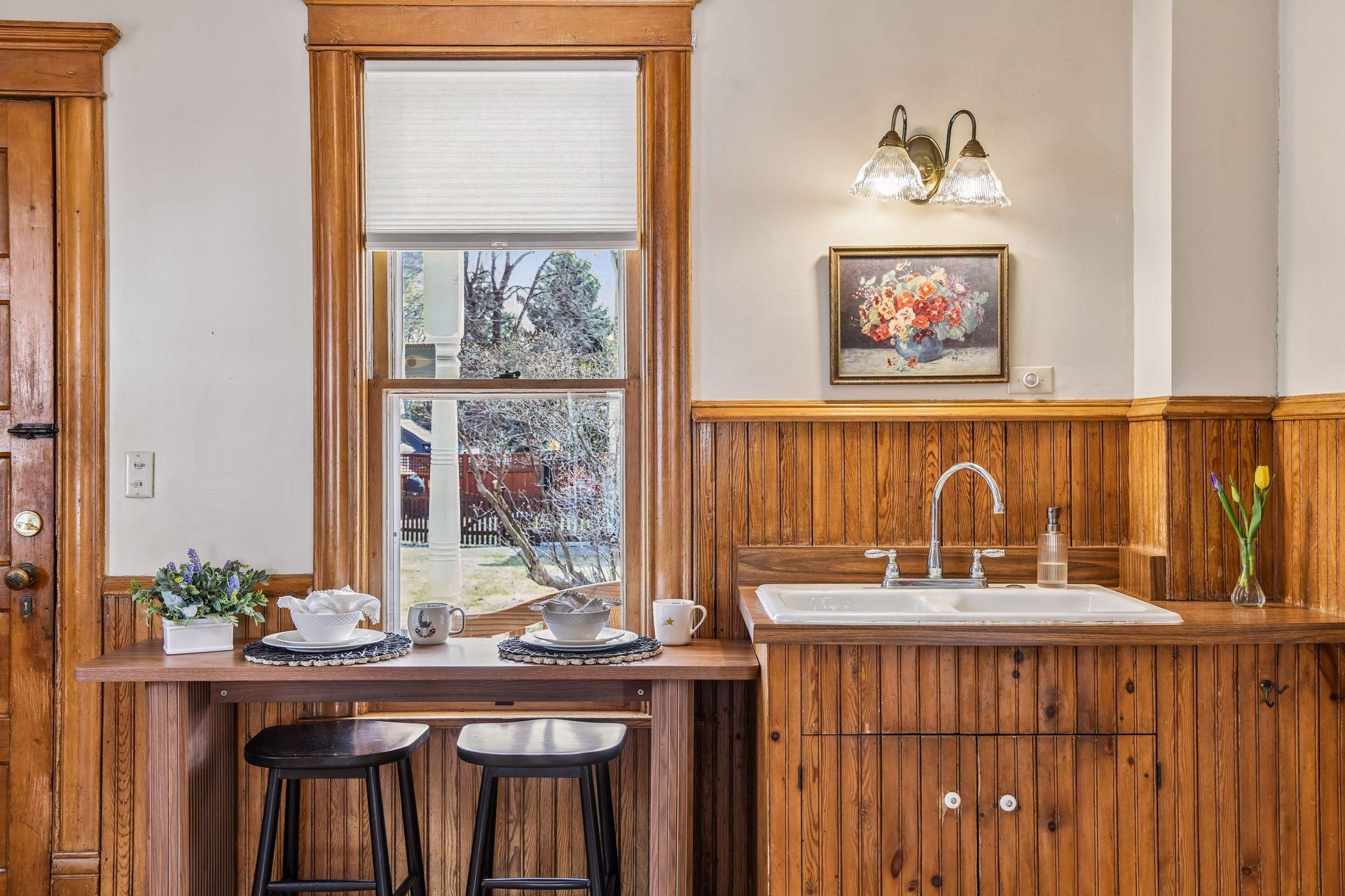 The breakfast bar overlooks the spacious double-lot yard.