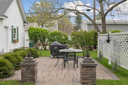 Gorgeous paver patio with a privacy screen