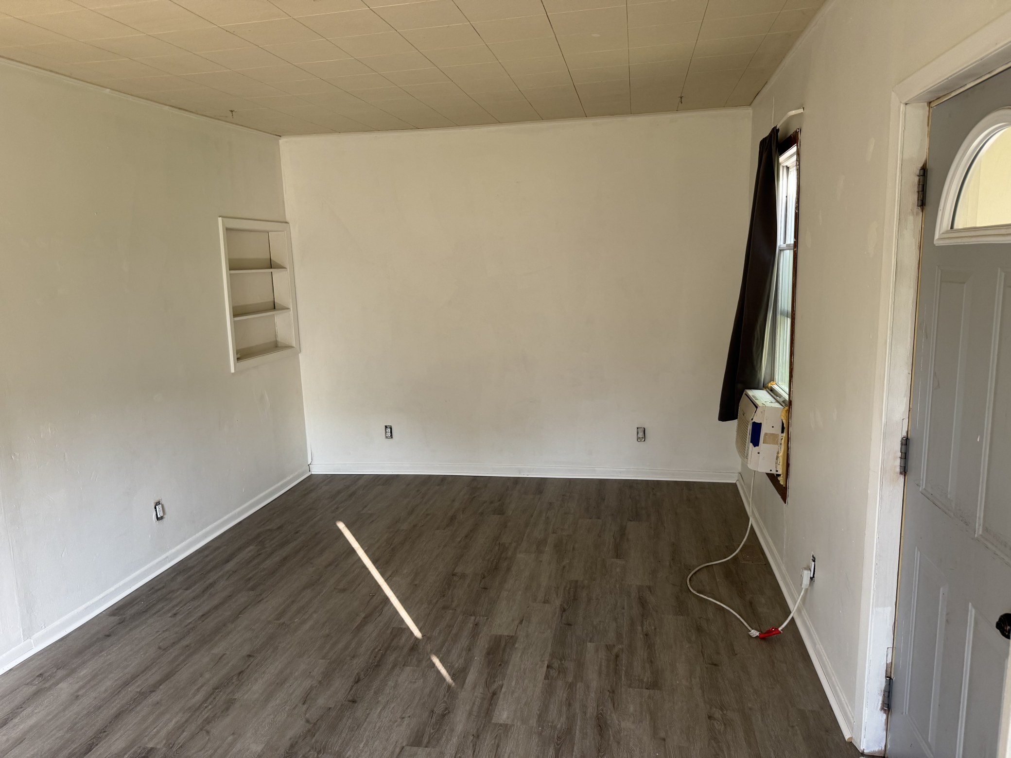 Inside the home we find updated flooring in nearly every room