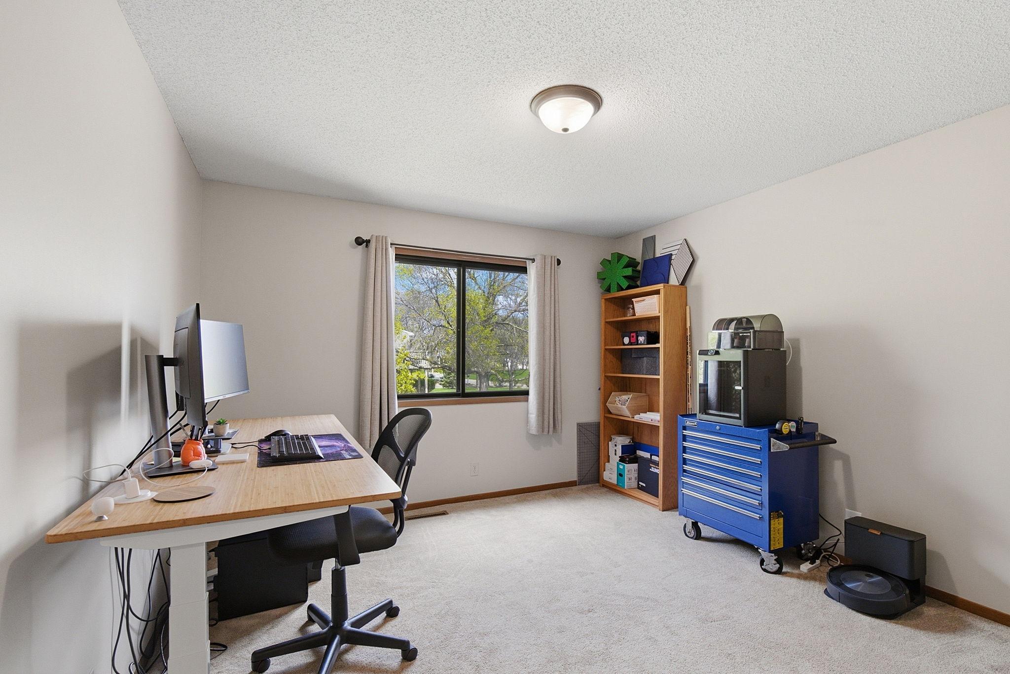 Bedroom #2 currently being used as an office.