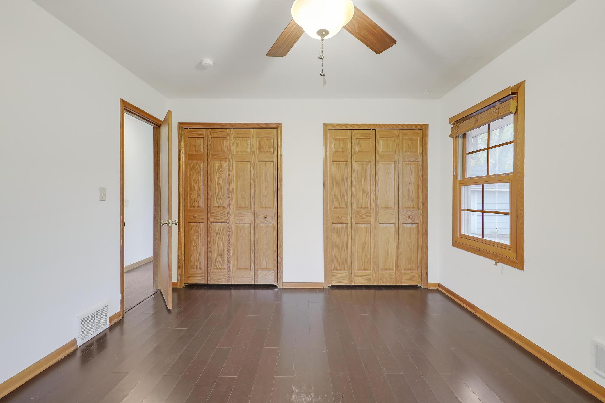 And it features double closets with pretty paneled doors.