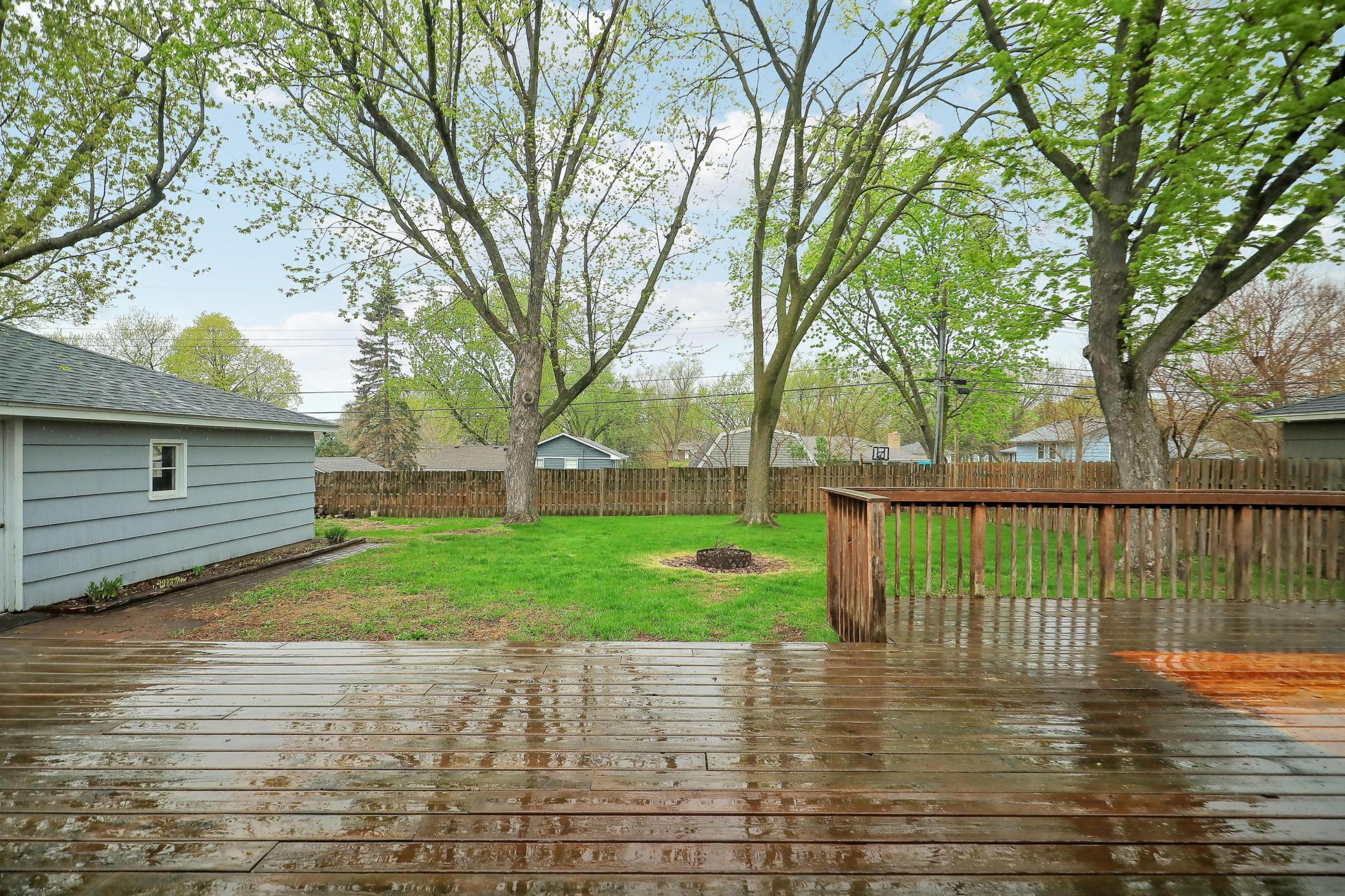 Private backyard fully fenced. Hang out and enjoy your firepit!