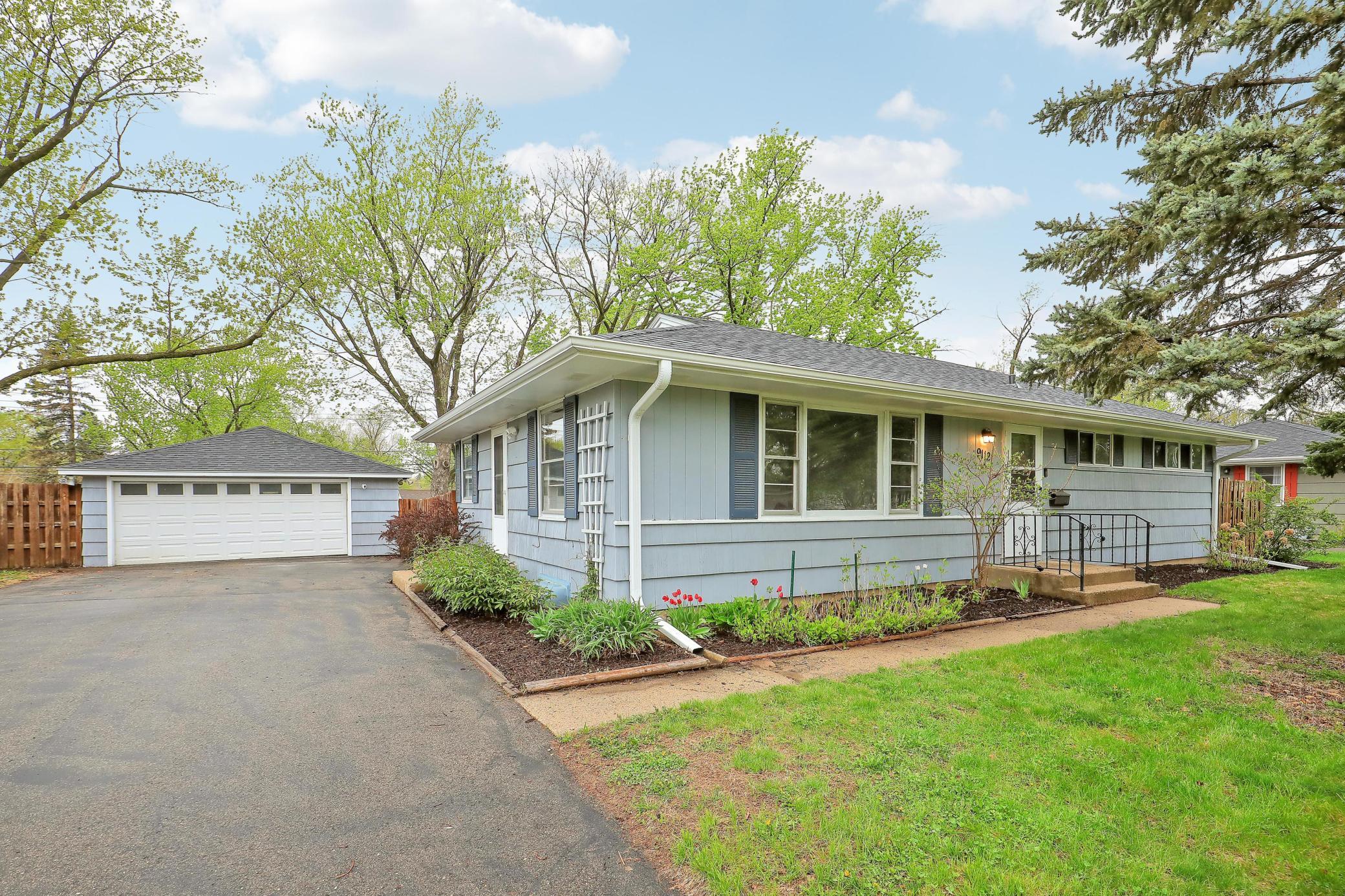 Darling Bloomington 3 bed, 2 bath rambler featuring a new 2024 roof & gutters and 2023 furnace!