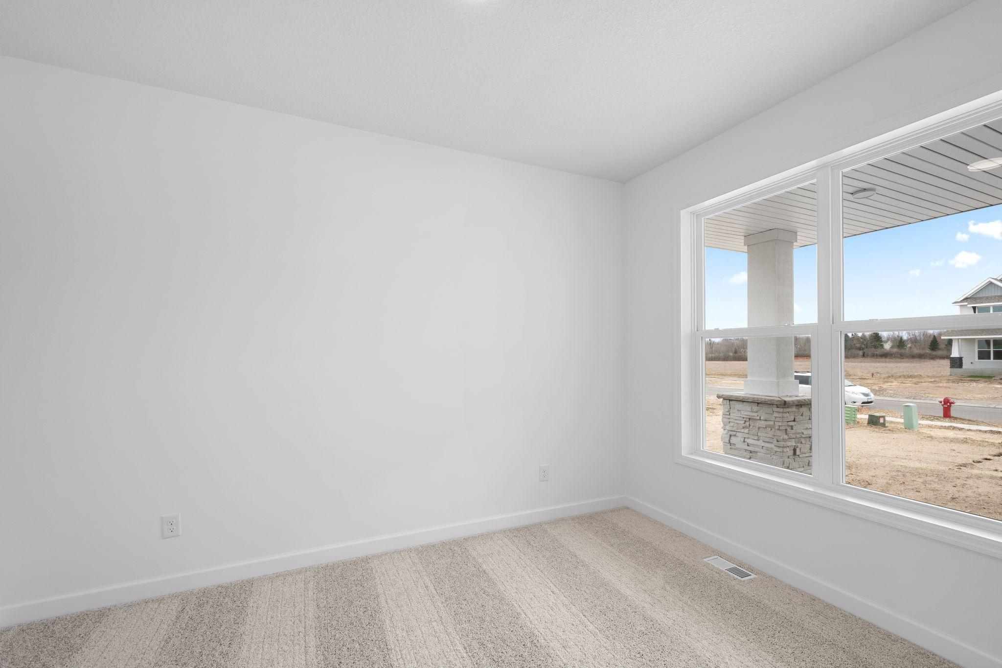 (Photo of a similar home, actual finishes may vary) The first-floor flex space can easily operate as a formal dining room, sitting room or home office.