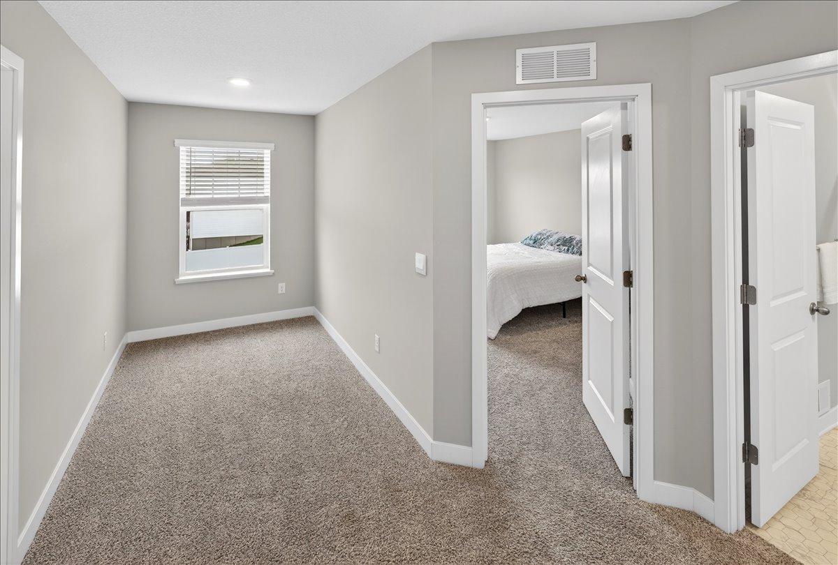 Add a separate toy area to this area outside bedrooms 3 & 4