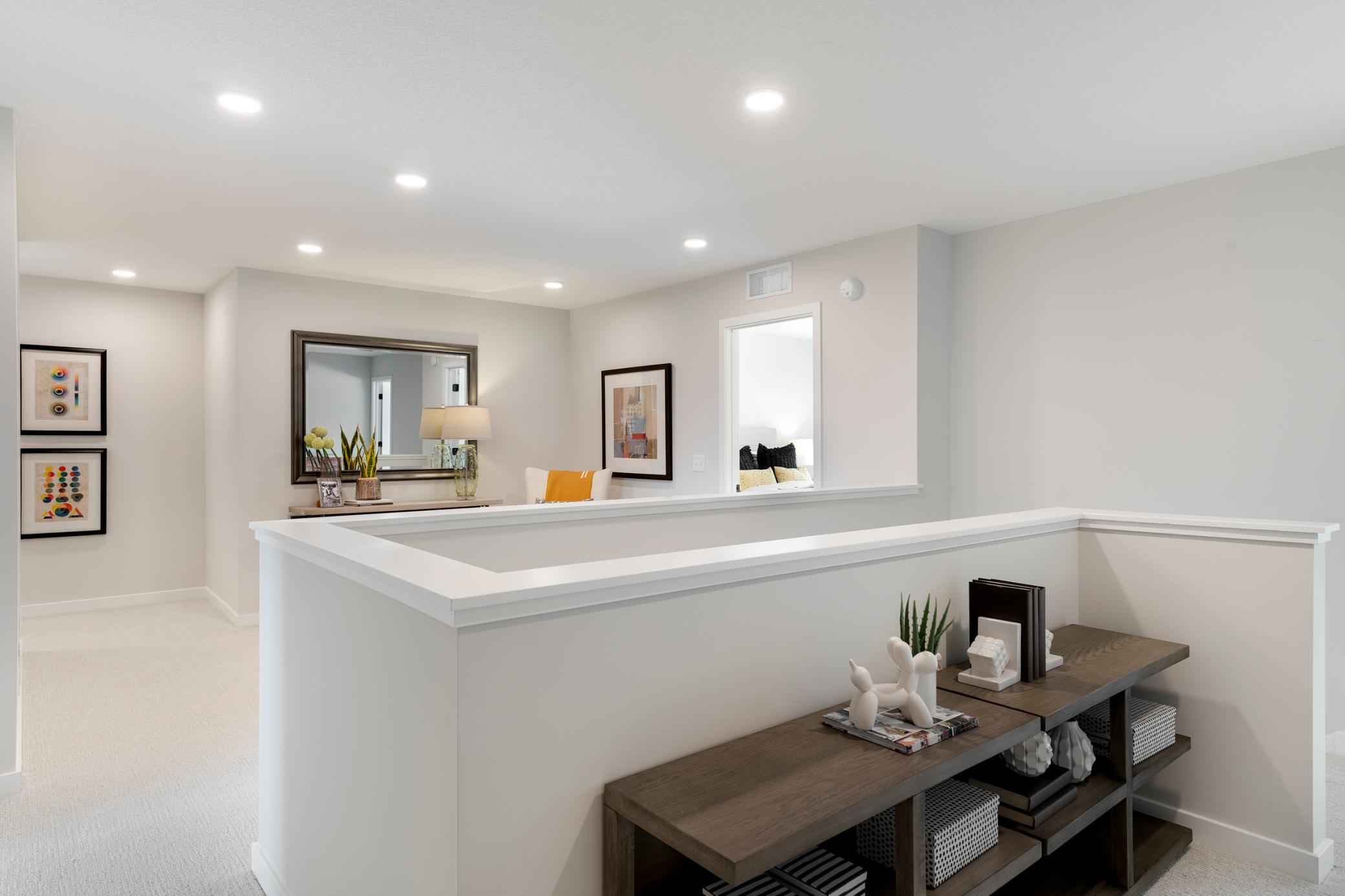 2nd floor includes 4 bedrooms, loft, and perfect nook for bookcase, storage shelving or desk! And convenient 2nd floor laundry room.