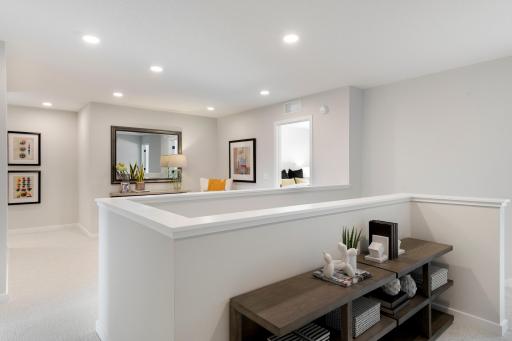 2nd floor includes 4 bedrooms, loft, and perfect nook for bookcase, storage shelving or desk! And convenient 2nd floor laundry room.