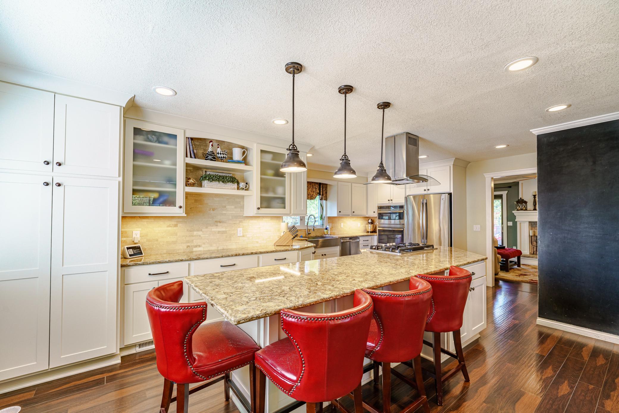 There is a pantry near the window, as well as a chalkboard wall for fun family messages.