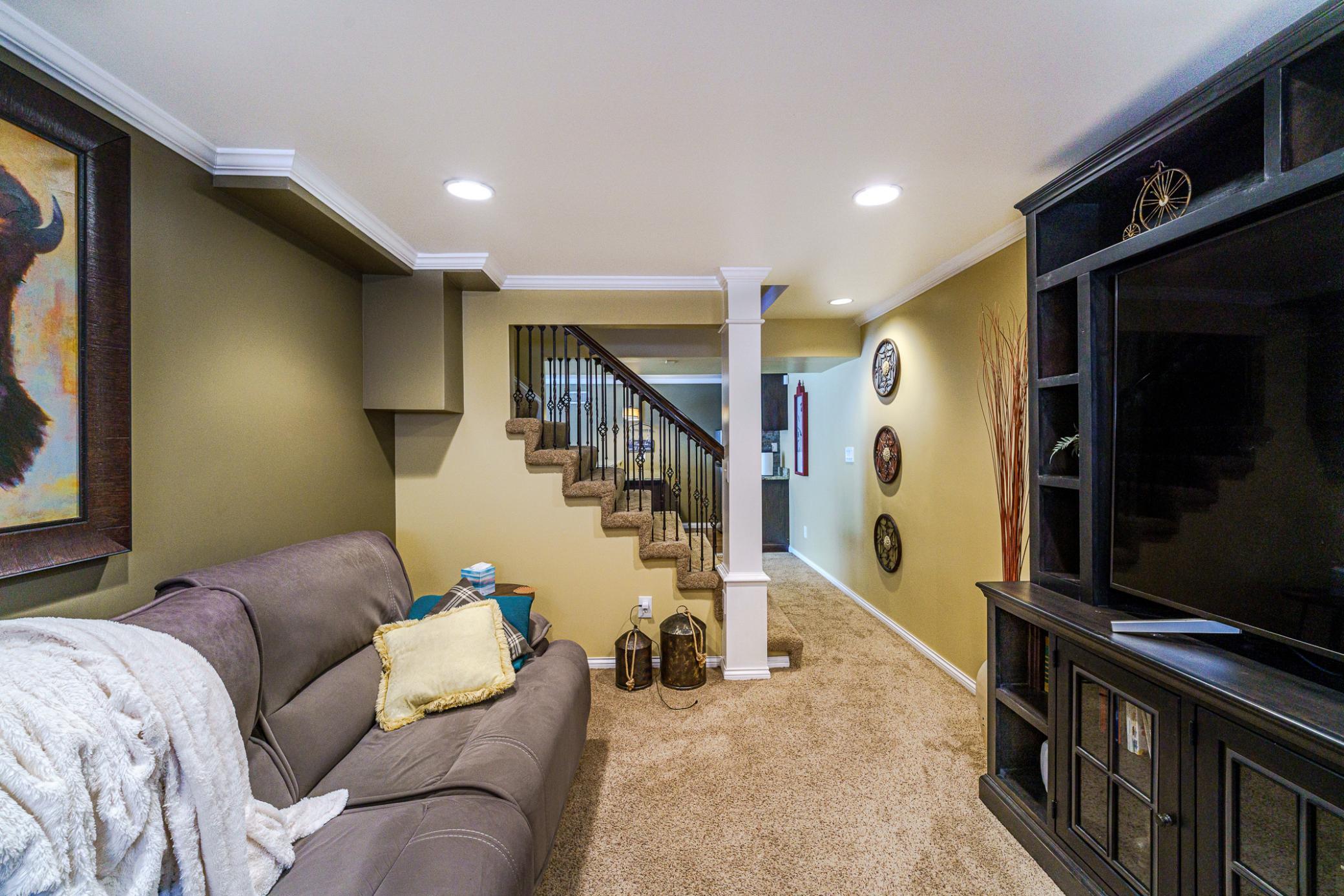 The theater room is casual and comfortable.
