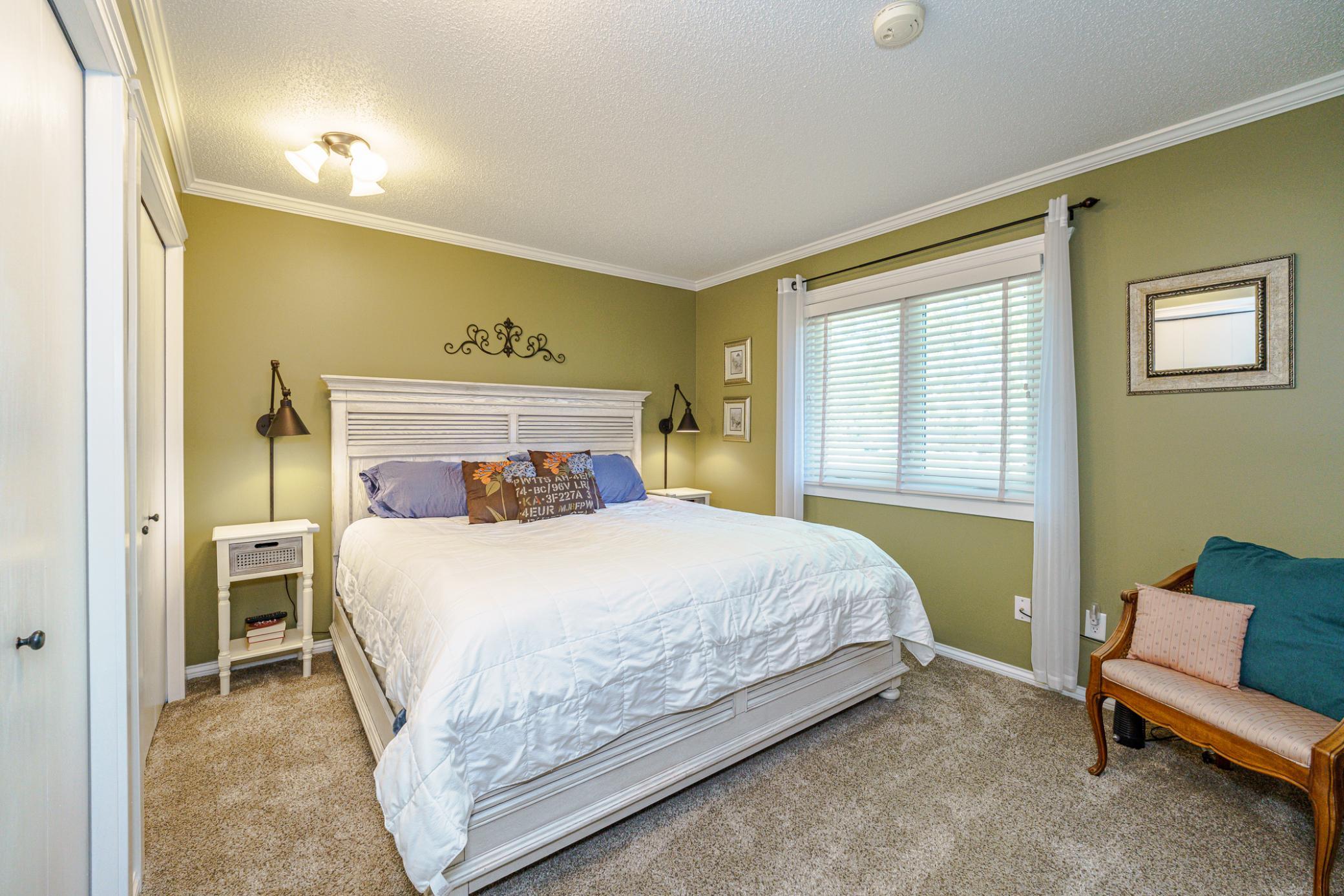 This is one of four upper level bedrooms. All have crown molding.