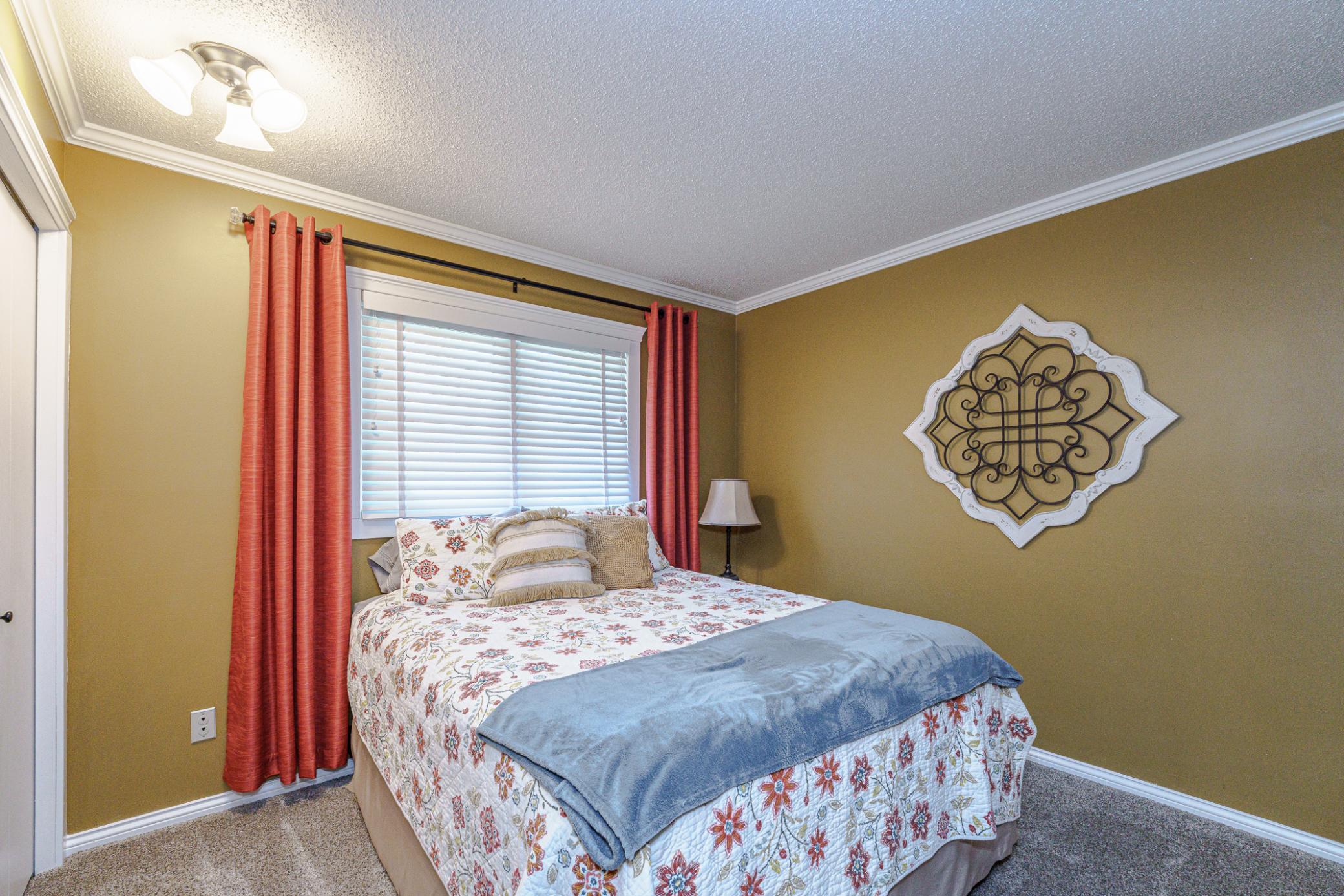 This is one of four upper level bedrooms.