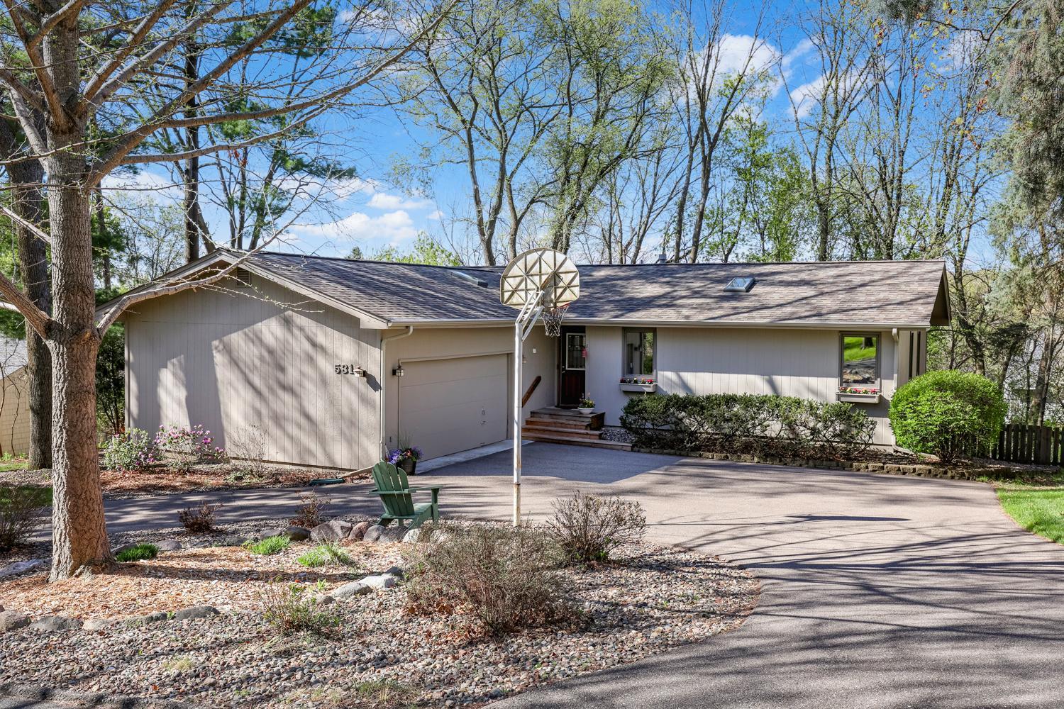 Drive way is a semi-circle affording easy access and parking