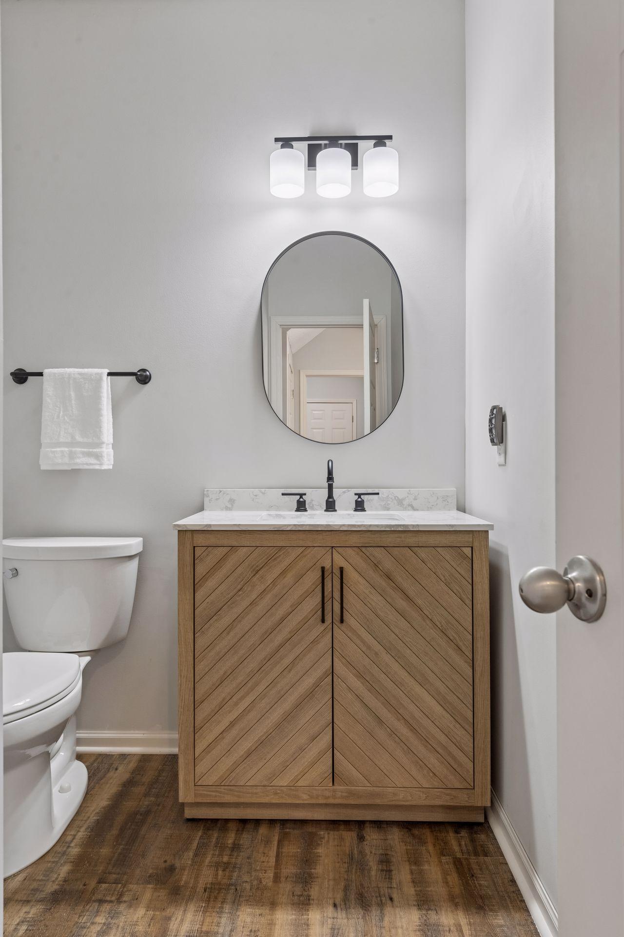 The main level powder room has also been updated.