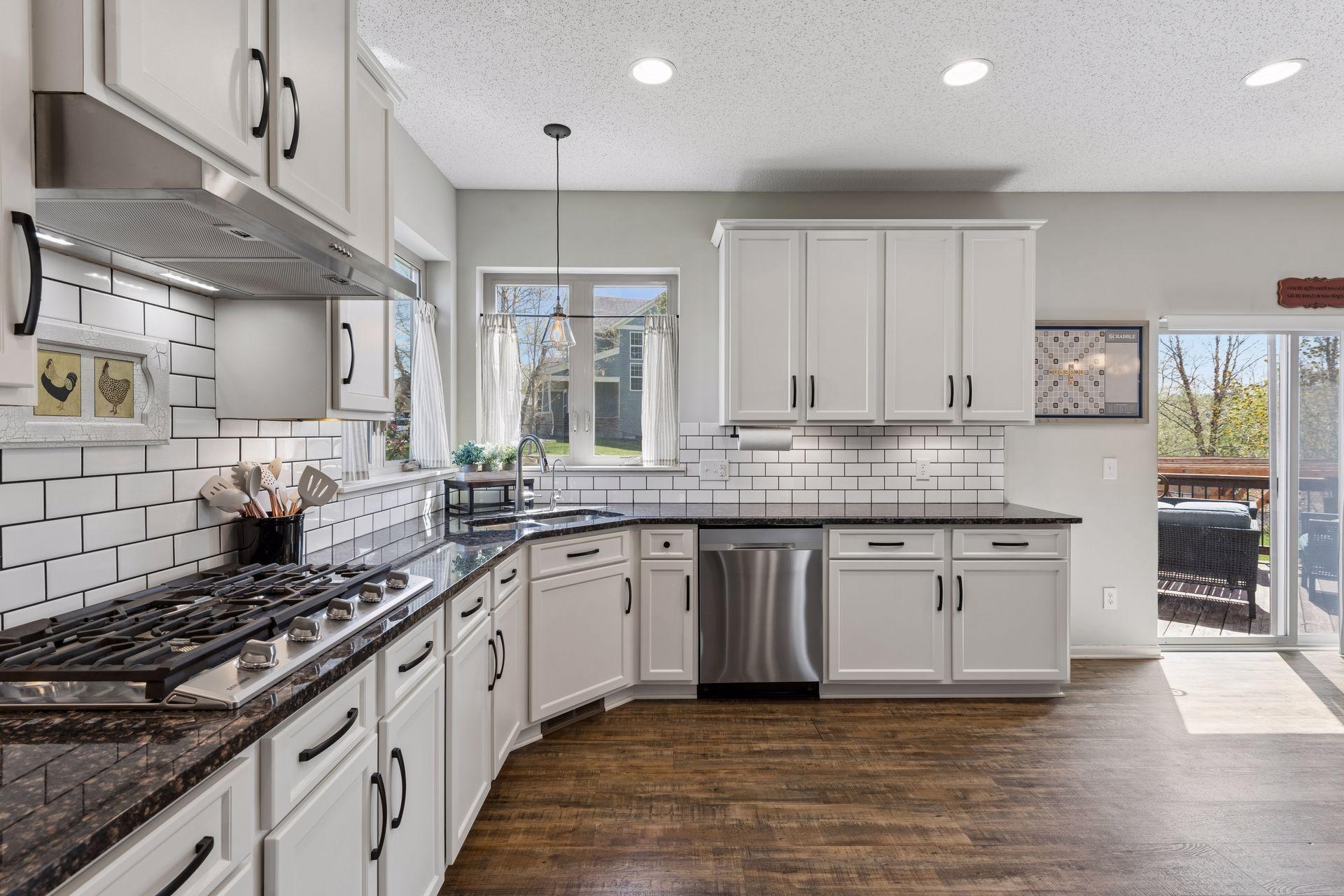 The corner sink and windows provides an expansive view.