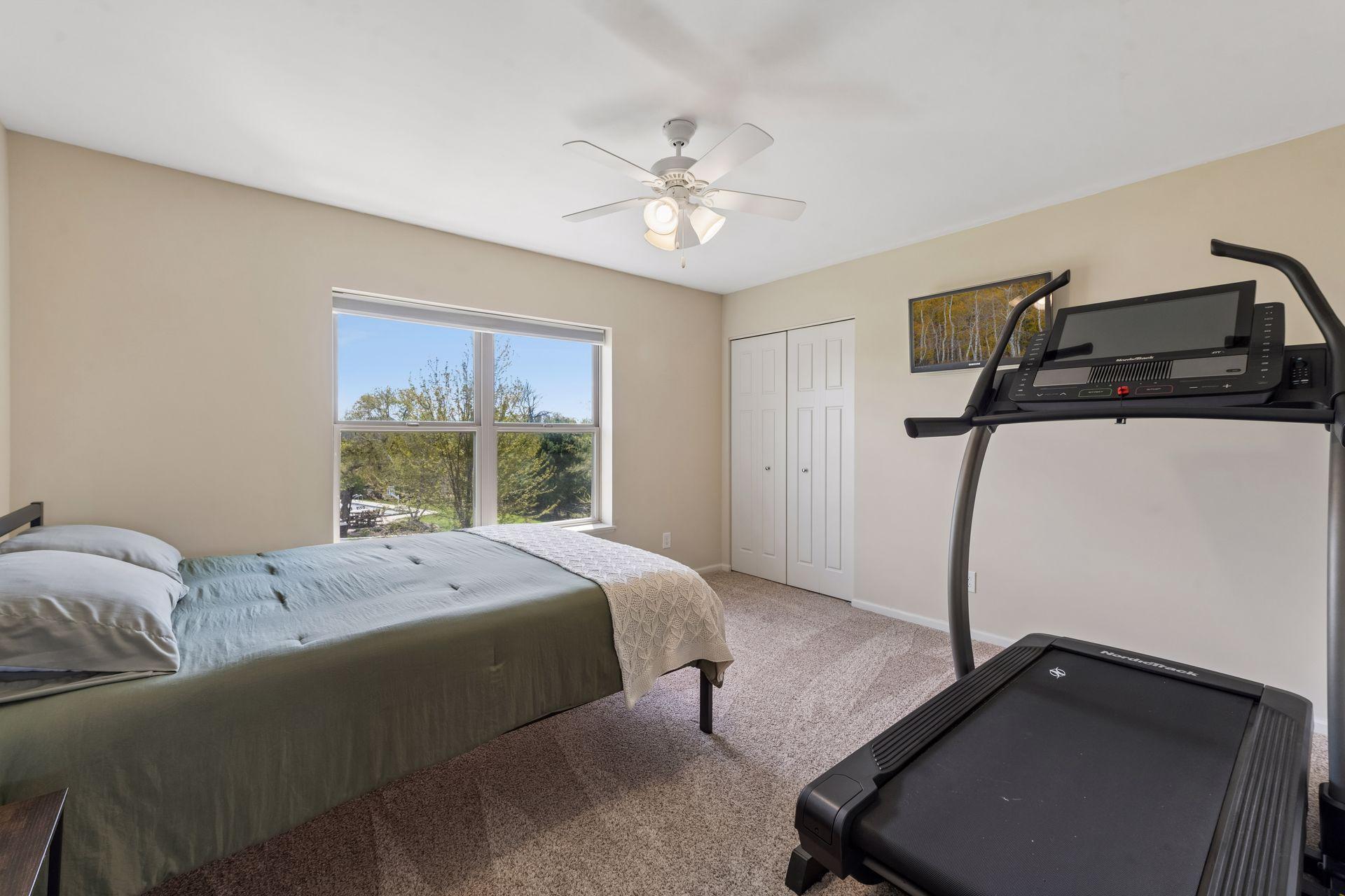 The second bedroom has a ceiling fan and reach-in closet.