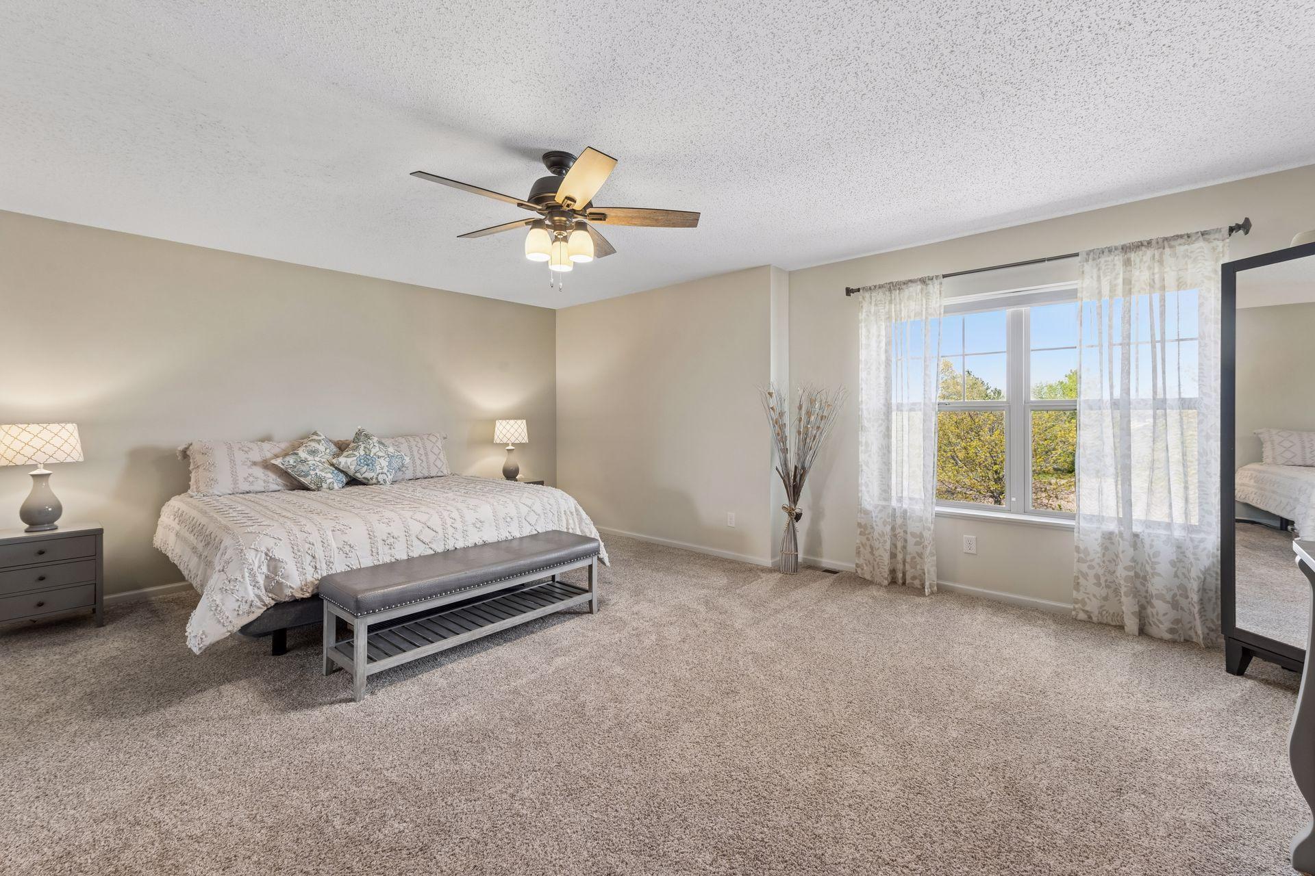 The massive primary bedroom has space to add a sitting area.
