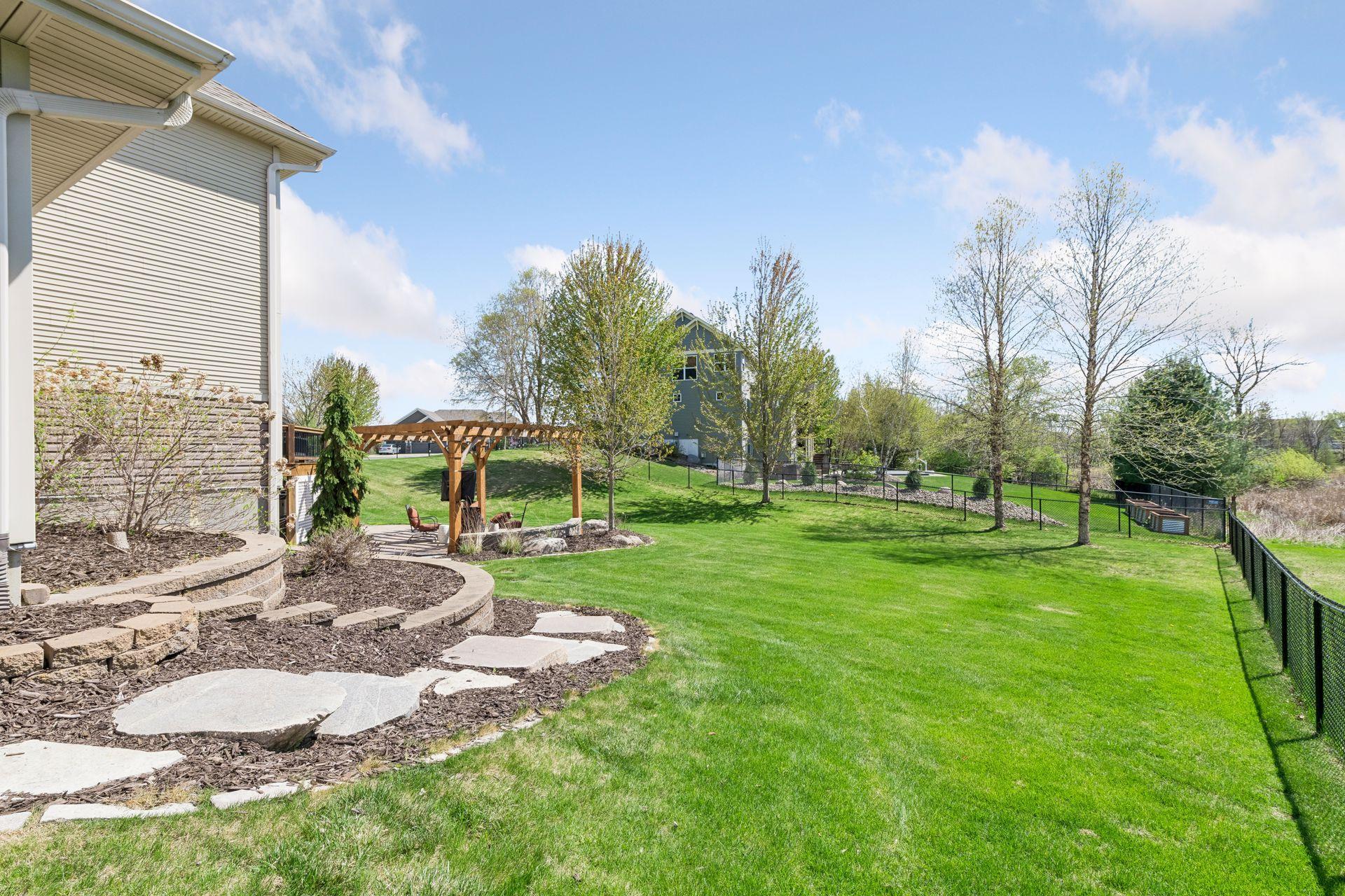 This photo from the other side of the yard show off the size of the lot. It is nearly a half an acre.