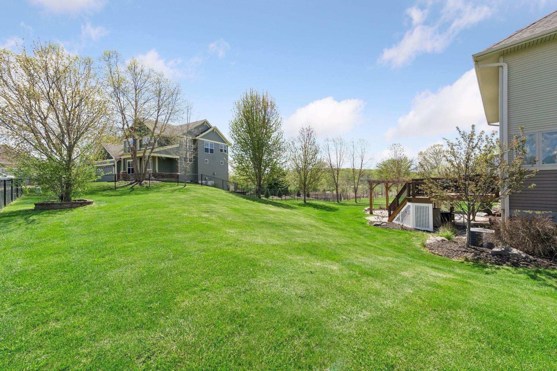 The home sits on a large fully fenced corner lot with a sprinkler system.