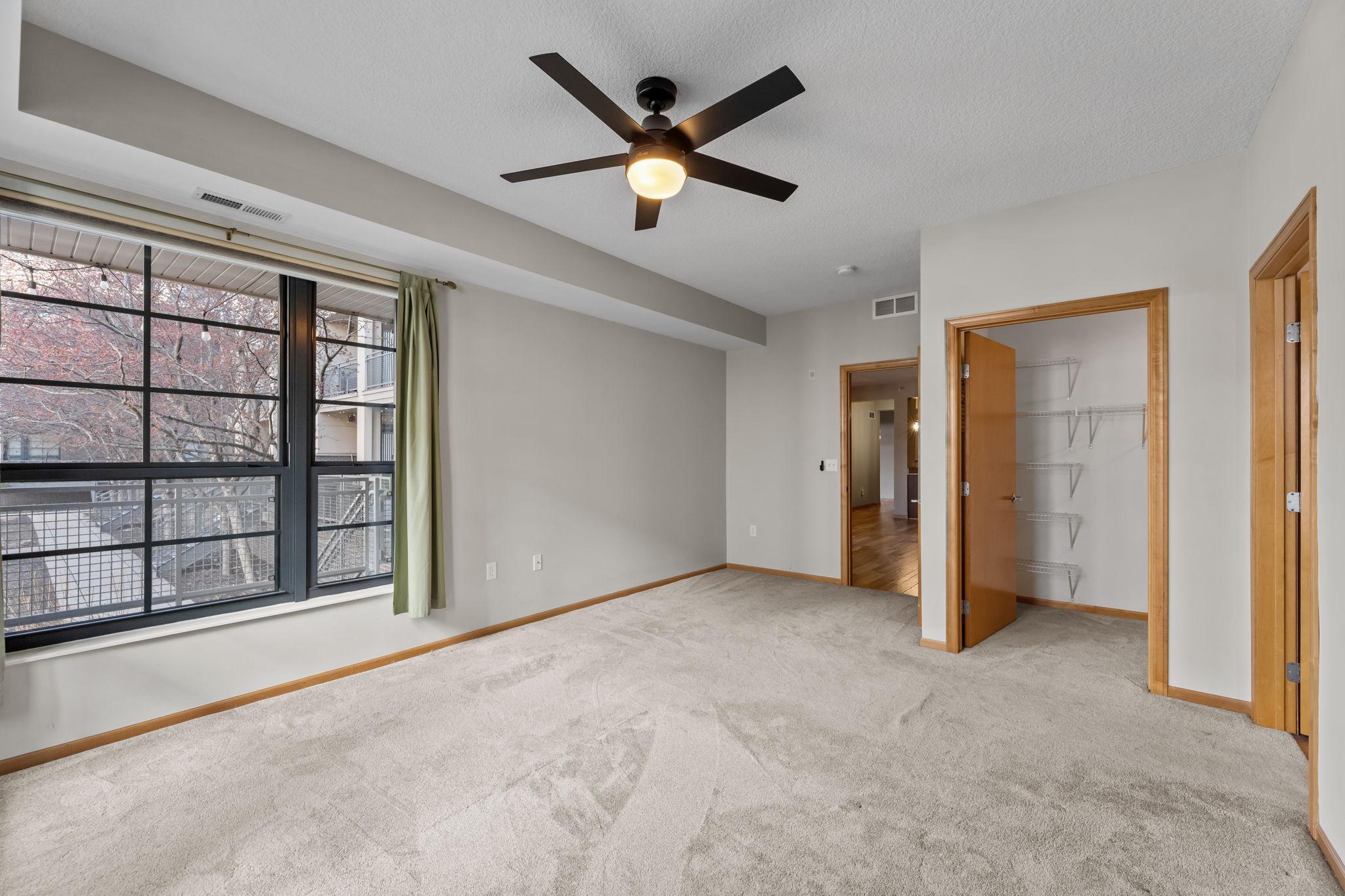 Primary with walk in closet and 3/4 bath