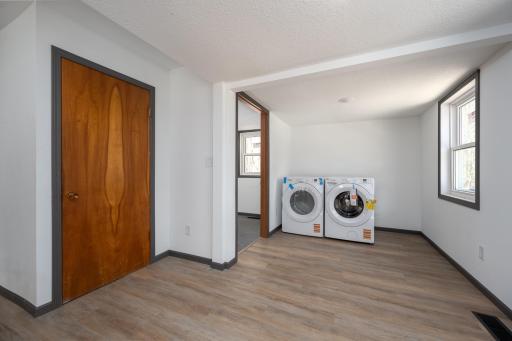 New laundry room with brand new washer and dryer
