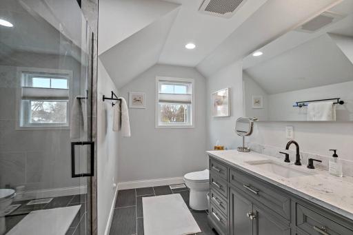 Fantastic upper level 3/4 bath with rain shower, shower wand and regular shower head.